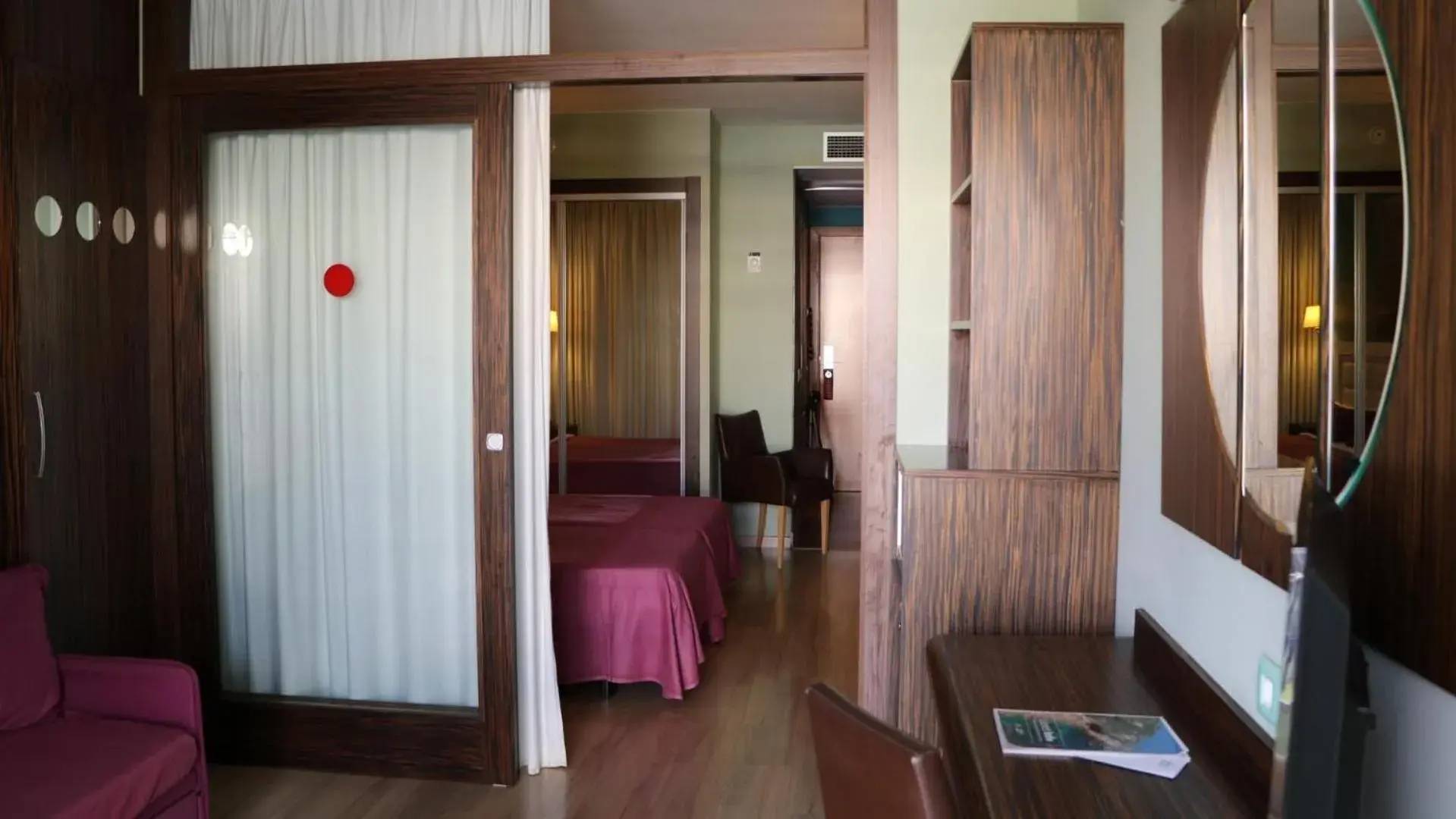 Photo of the whole room, Bed in Evenia Olympic Palace Photo of the whole room, Bed in Evenia Olympic Palace