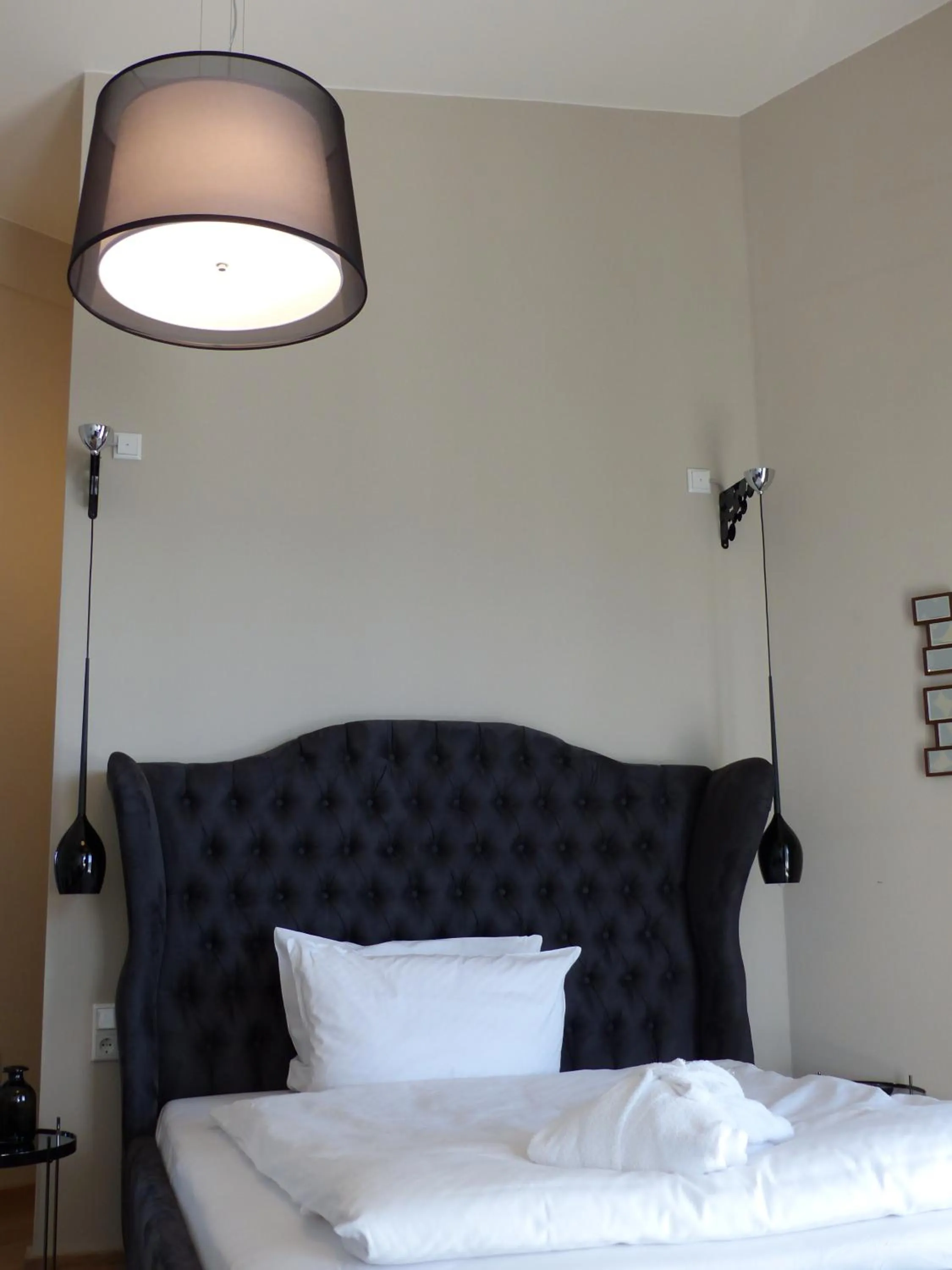 Bed in Parkhotel Heidehof Apartements