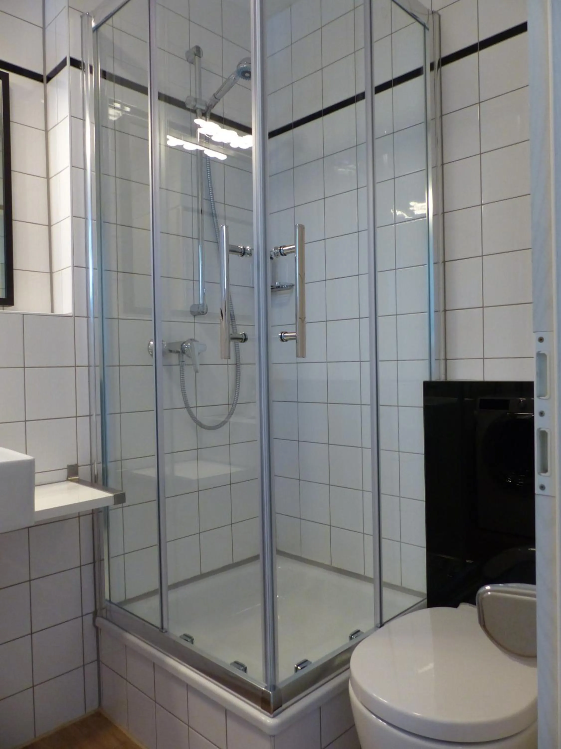 Shower in Parkhotel Heidehof Apartements