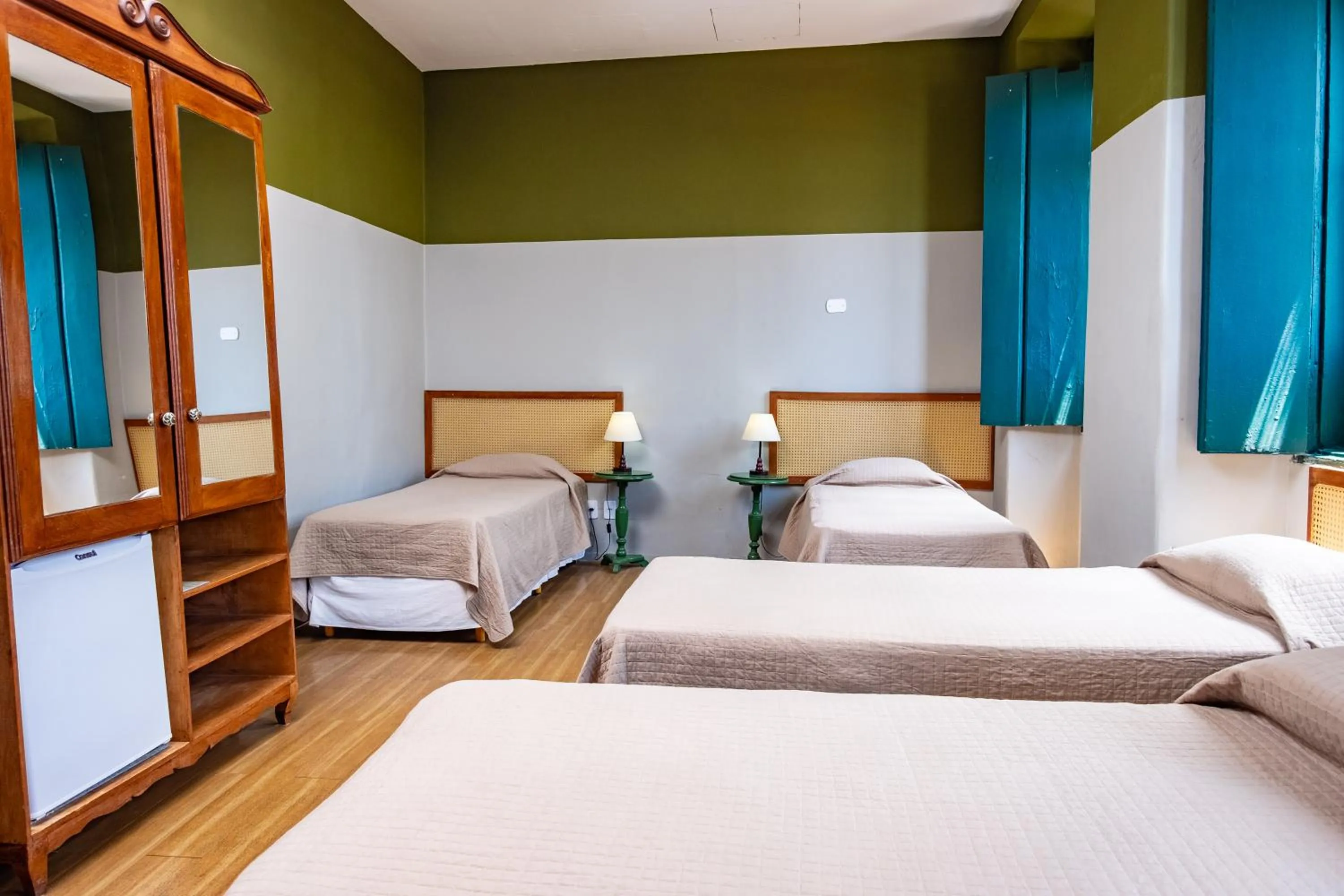 Bed in Pousada Colonial Chile