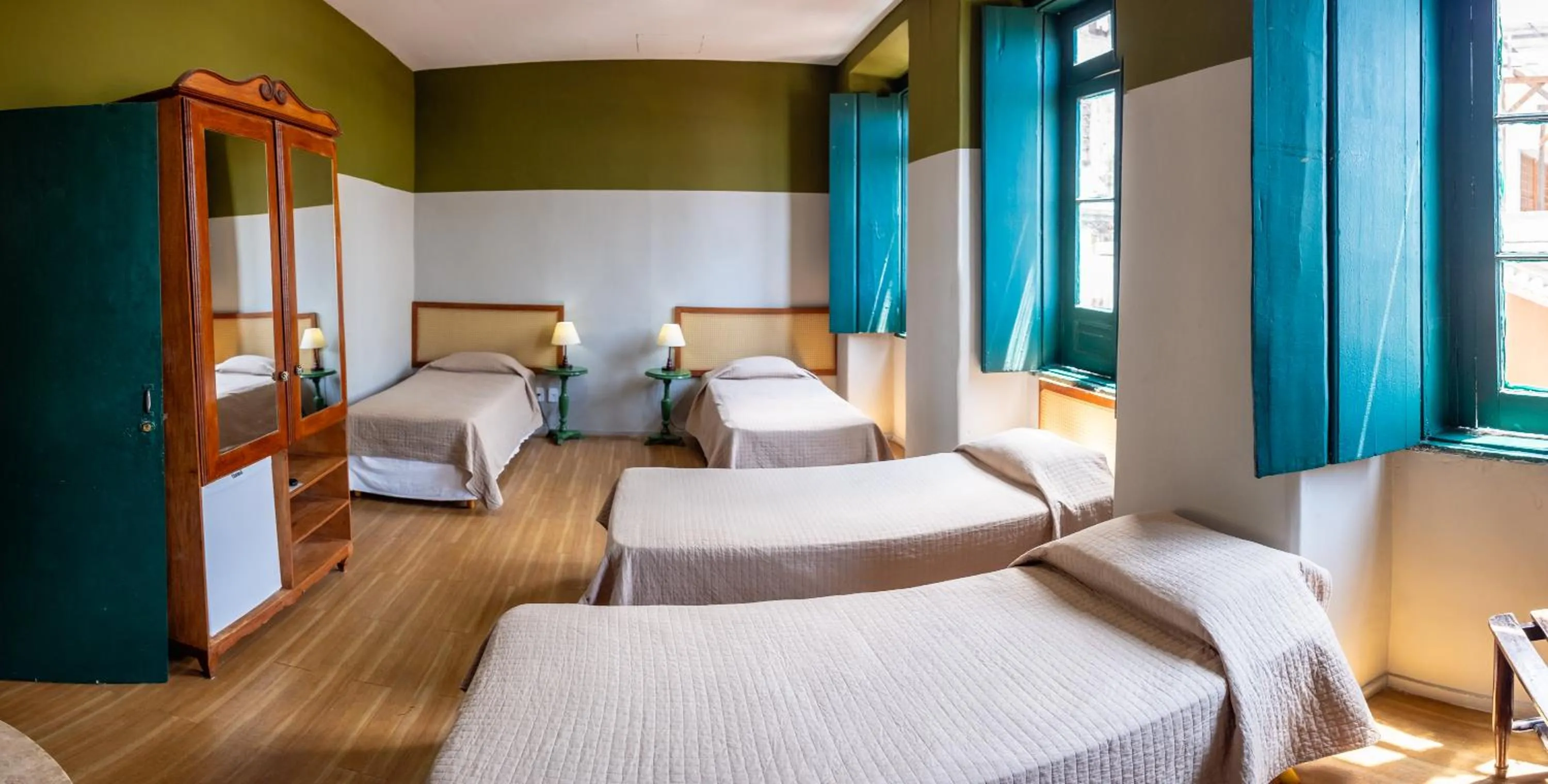 Bed in Pousada Colonial Chile