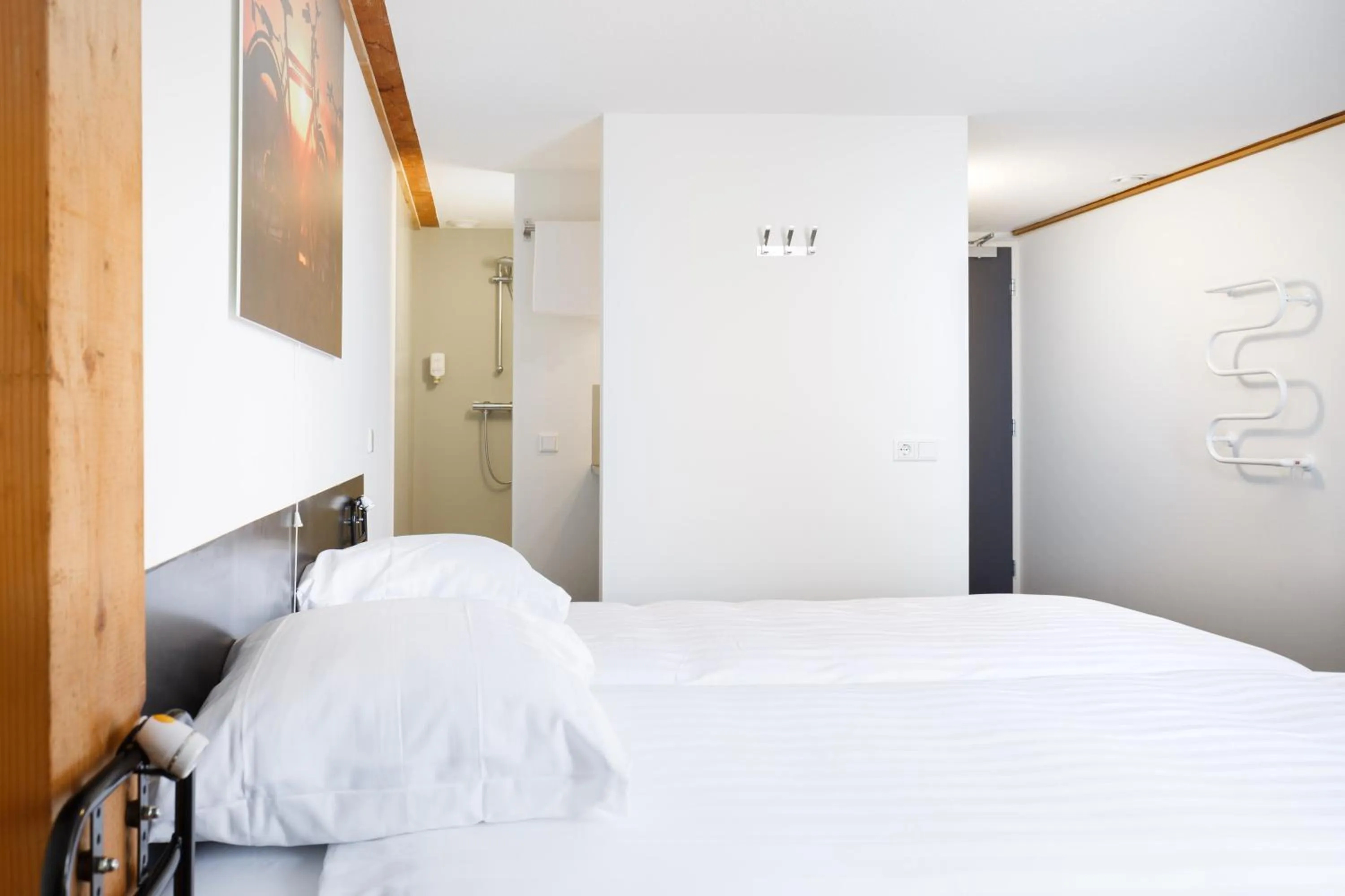 Photo of the whole room, Bed in Hotel Blooker