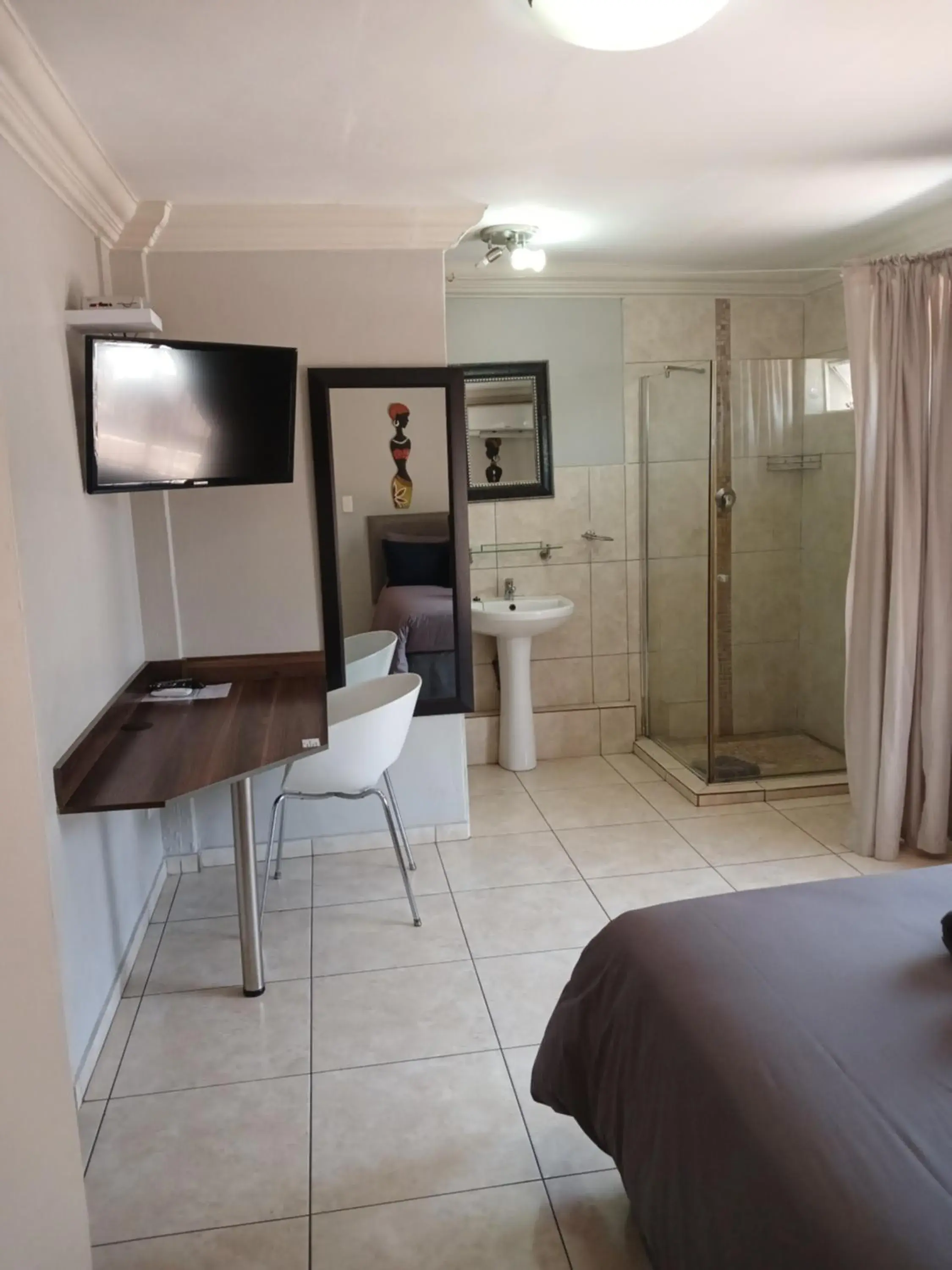 Bed in Blue Sparrow Guest House Bed in Blue Sparrow Guest House