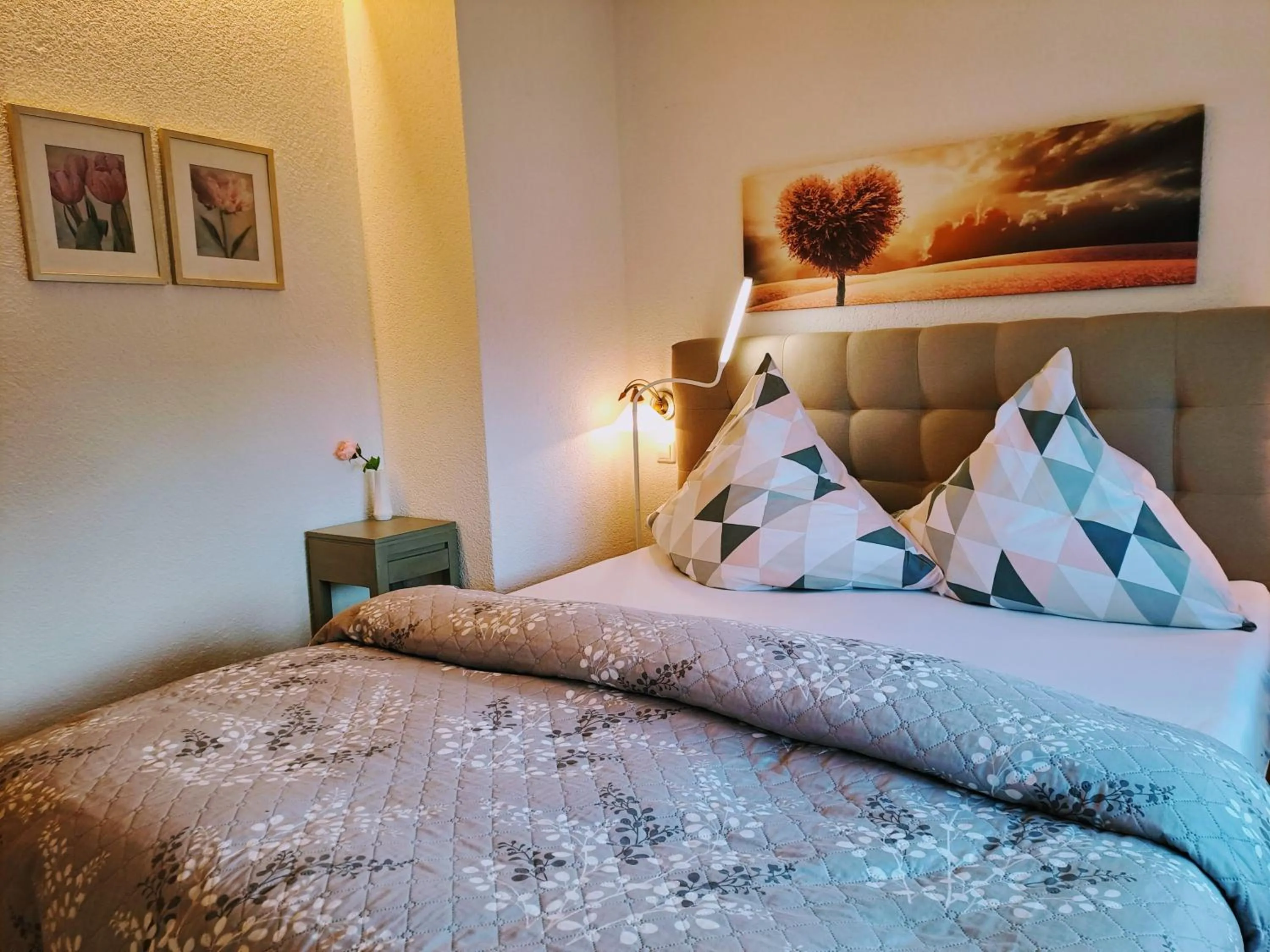 Bed in Ferienwohnung Luisa