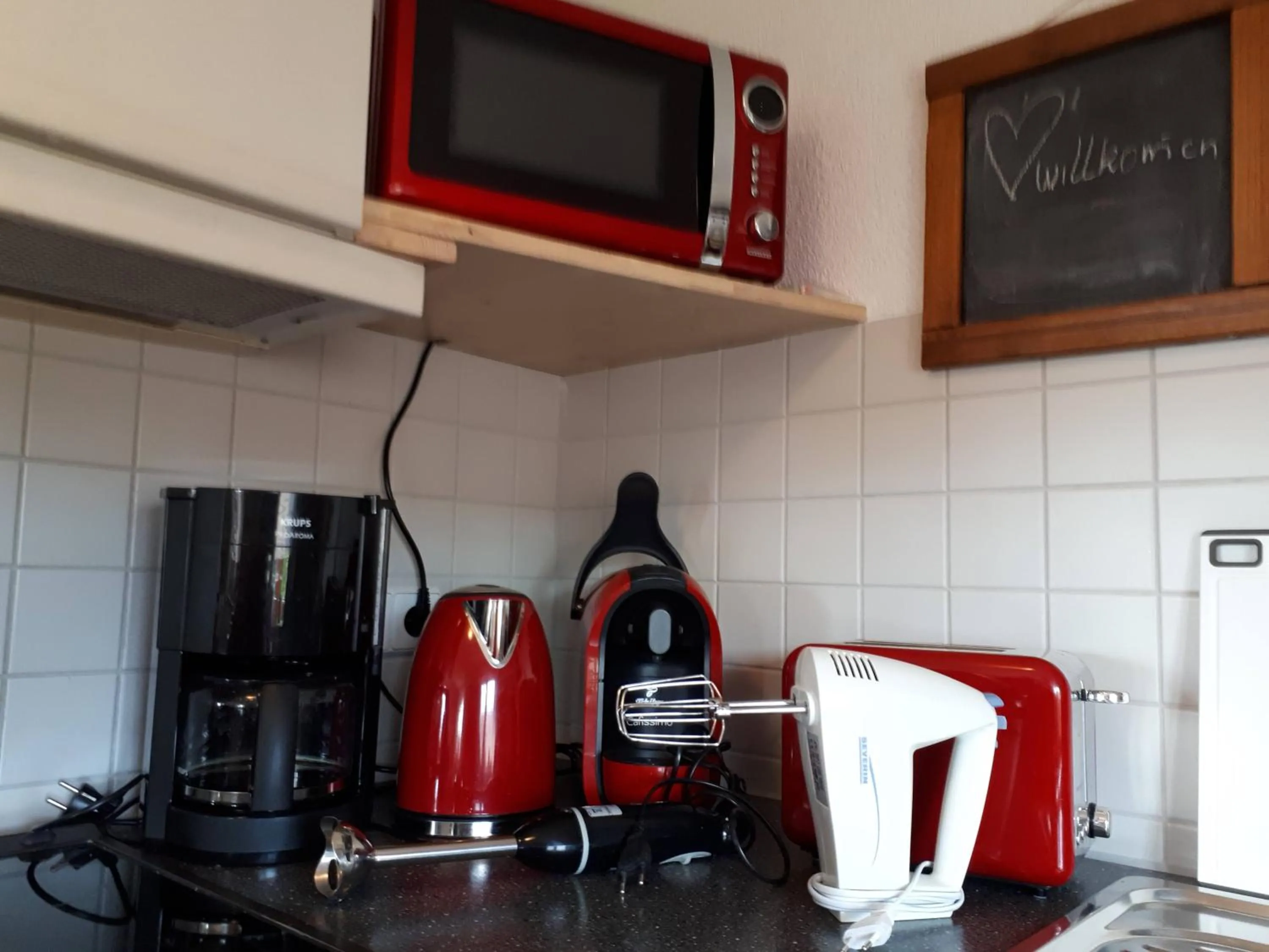 Kitchen or kitchenette in Ferienwohnung Luisa