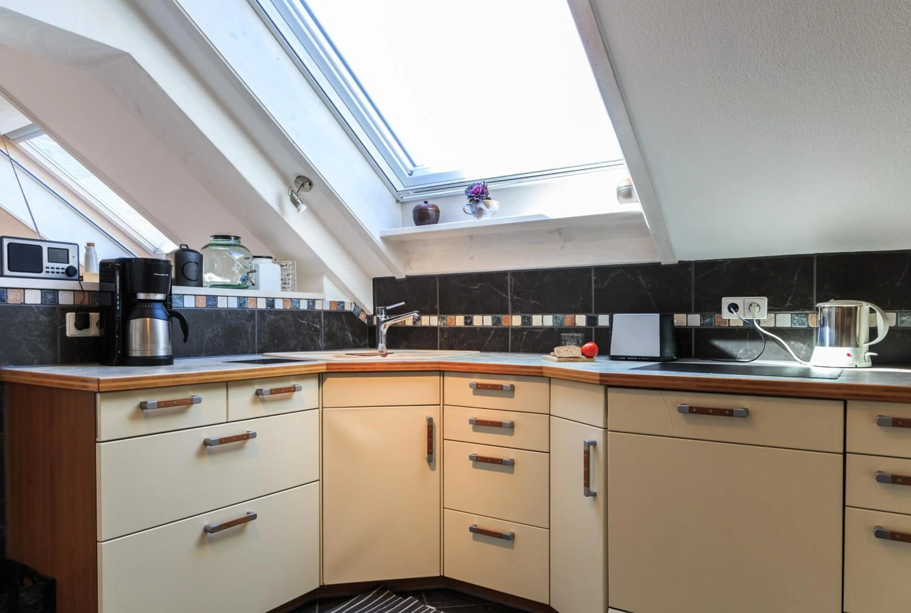 Kitchen or kitchenette in Ferienwohnung Luisa