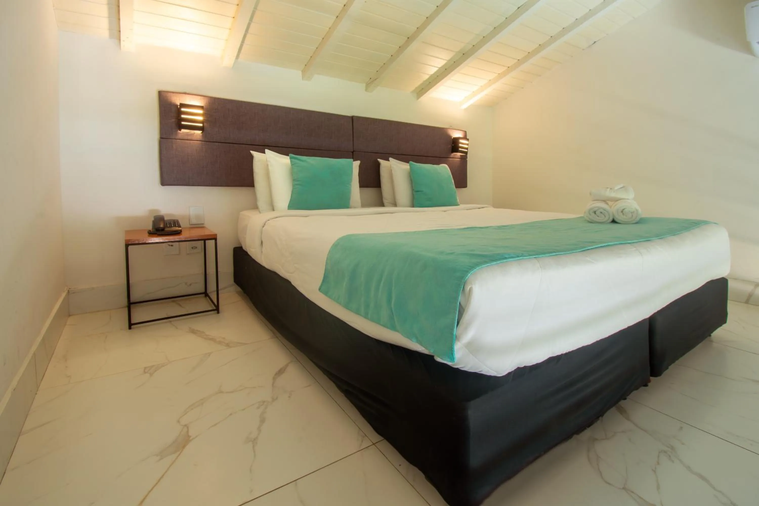 Bed in Pousada Aroma do Mar by Latitud Hoteles