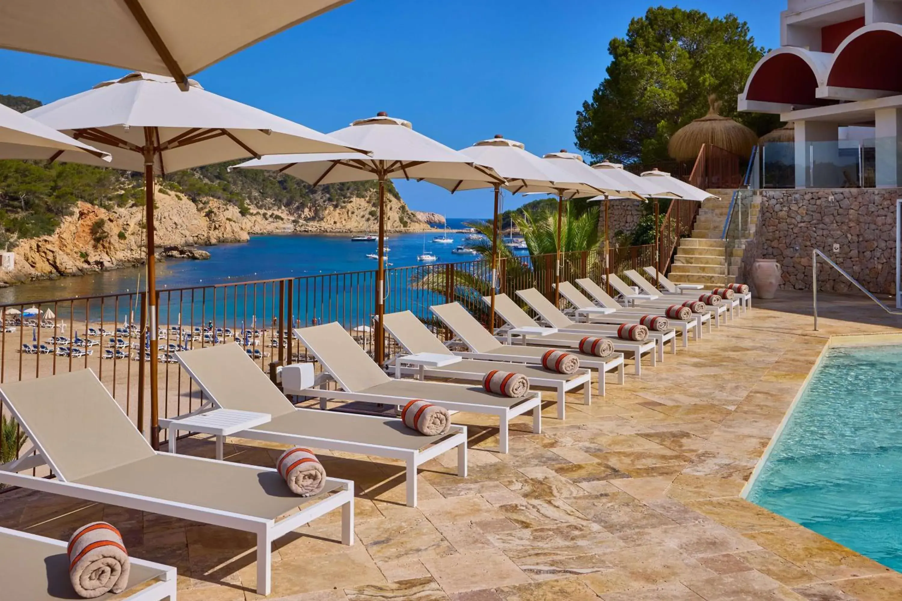 Pool view in Cala San Miguel Hotel Ibiza, Curio Collection by Hilton, Adults only Pool view in Cala San Miguel Hotel Ibiza, Curio Collection by Hilton, Adults only
