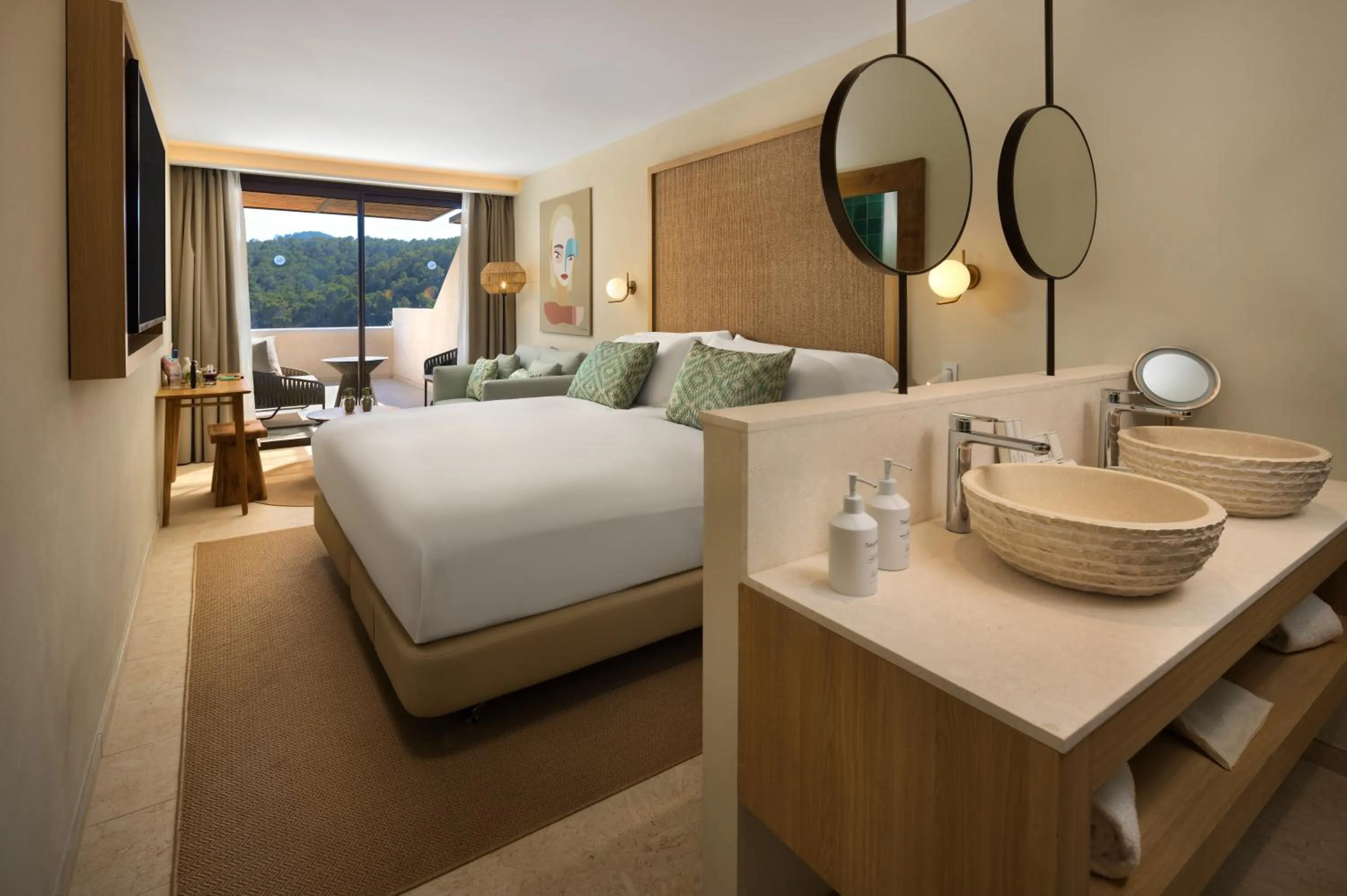 Photo of the whole room, Bed in Cala San Miguel Hotel Ibiza, Curio Collection by Hilton, Adults only