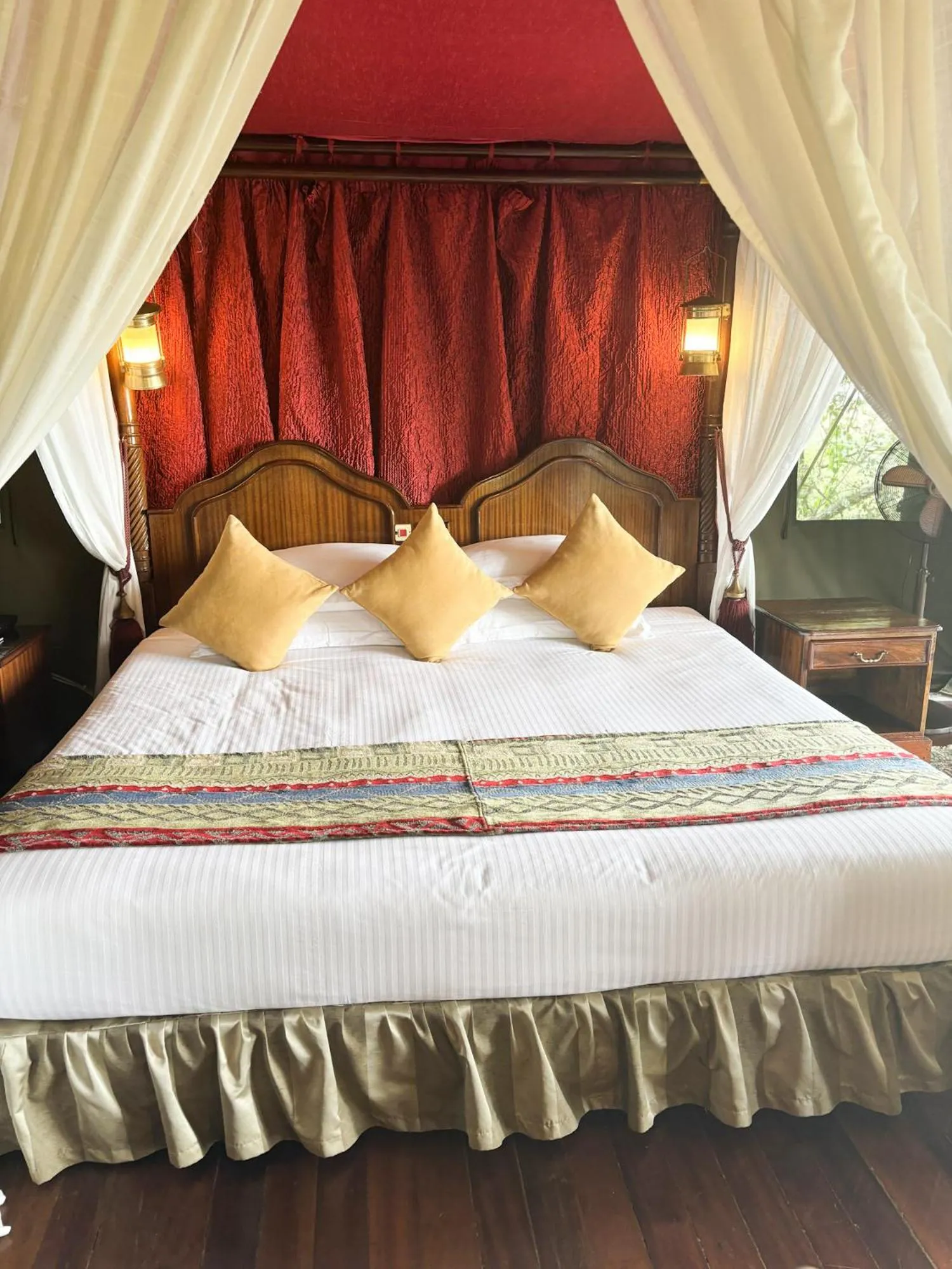 Bed in Kirawira Serena Camp
