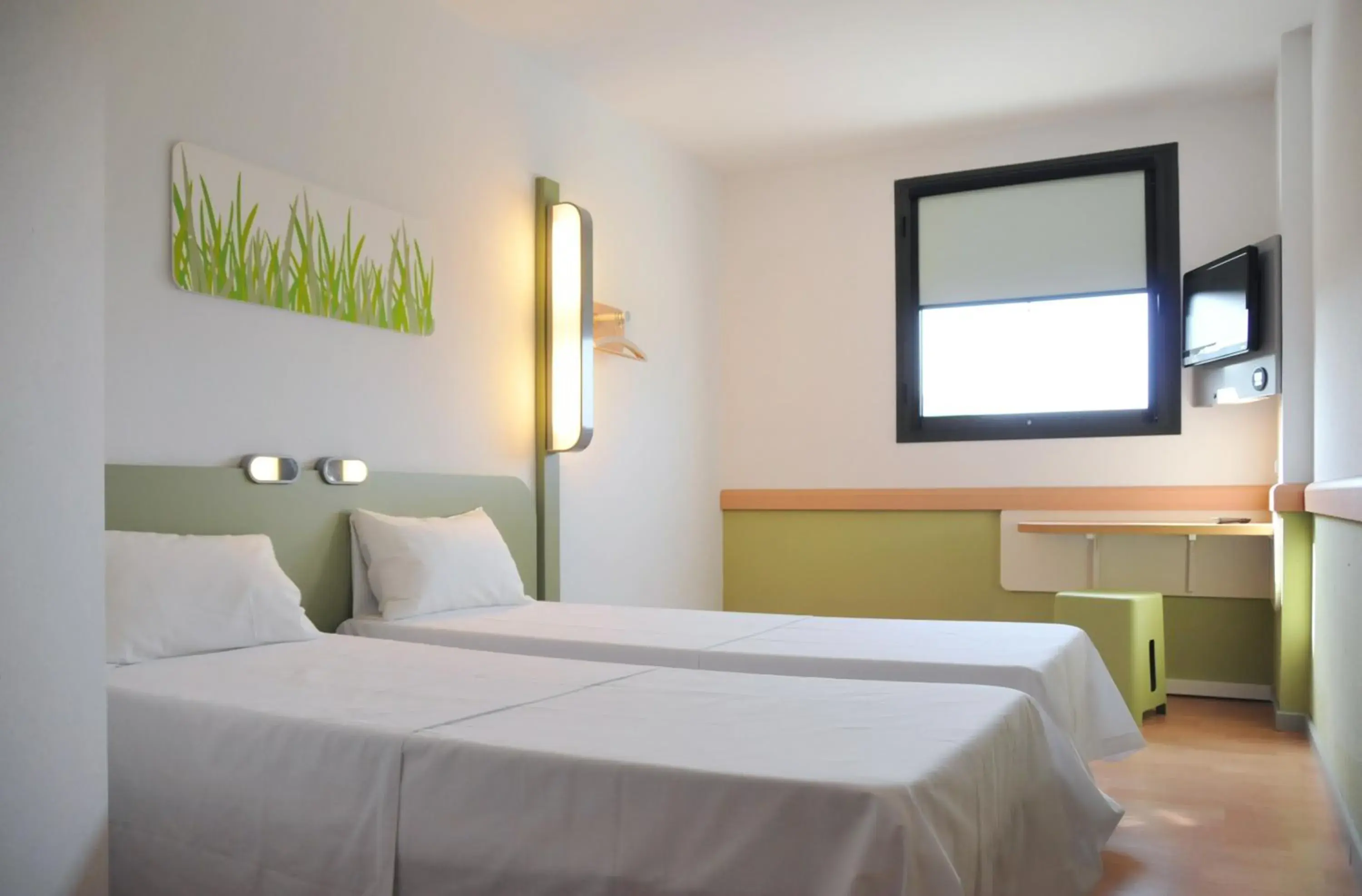 Bed in Ibis Budget Girona Costa Brava Bed in Ibis Budget Girona Costa Brava