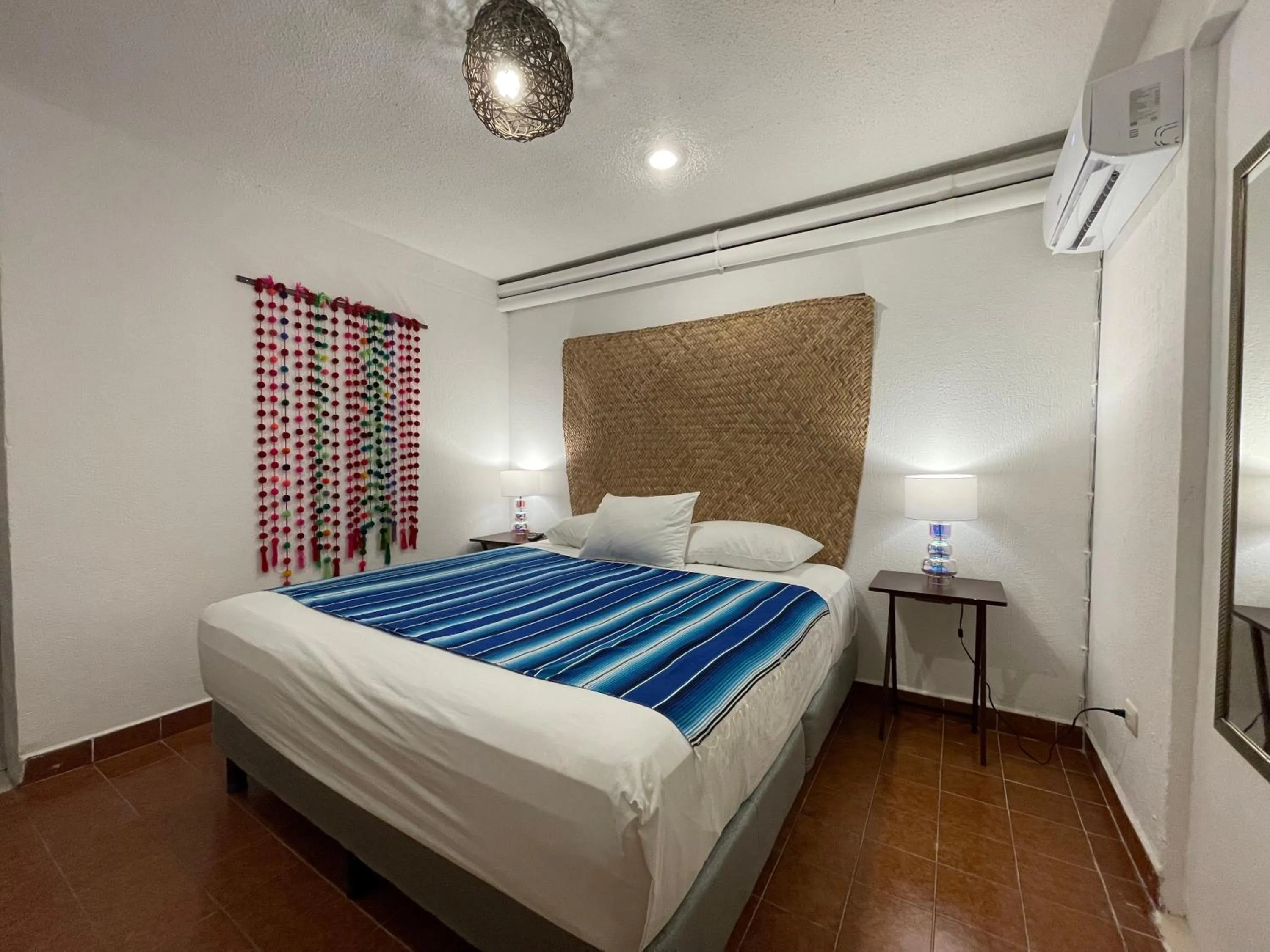 Bed in Hotel Villas Colibrí Suites & Bungalows