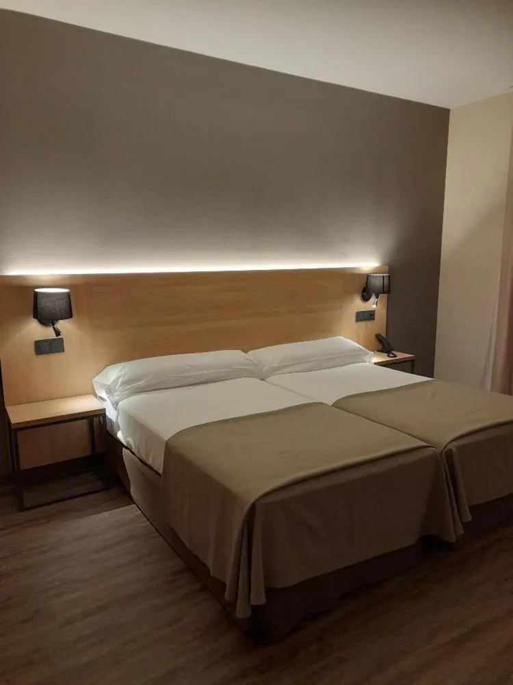 Bed in SOMMOS Hotel Benasque Spa