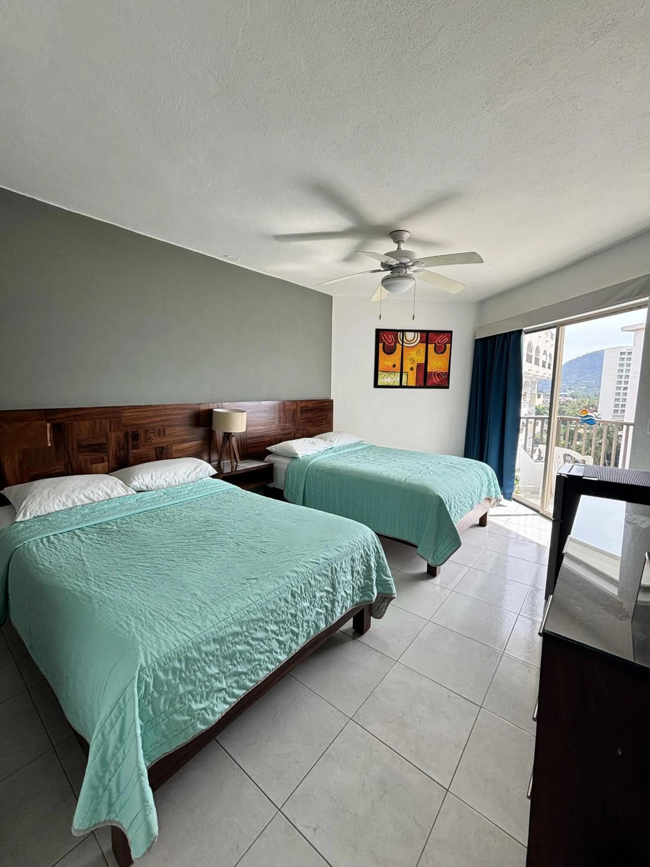 Bed in ENNA INN IXTAPA HABITACIóN VISTA AL MAR