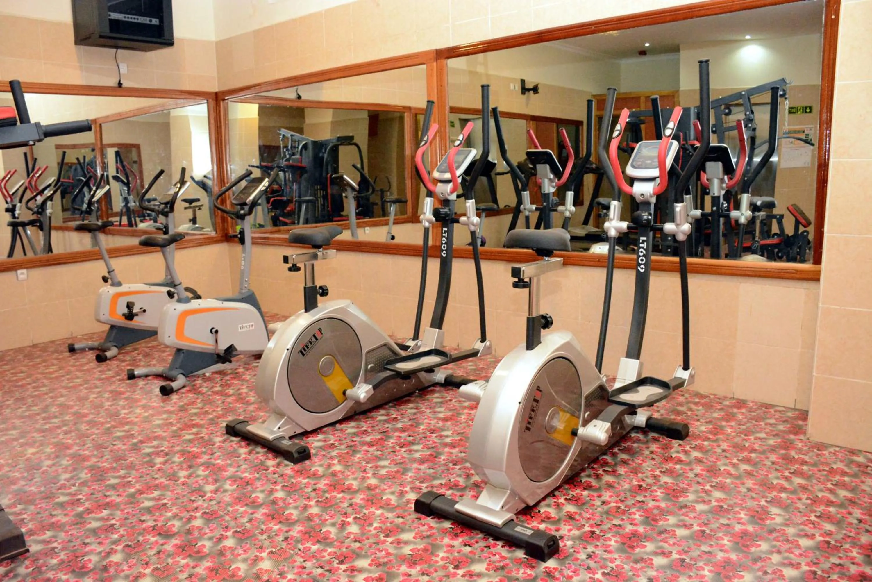 Fitness centre/facilities in La Posh Hotel