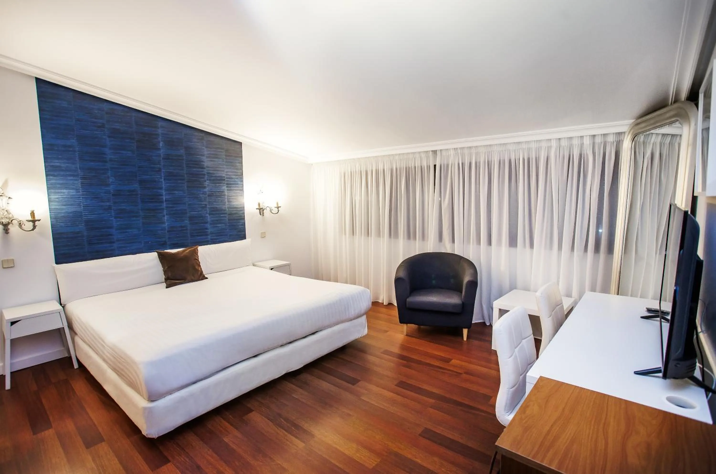 Bed in Hotel Conde Rodrigo II by eme hoteles