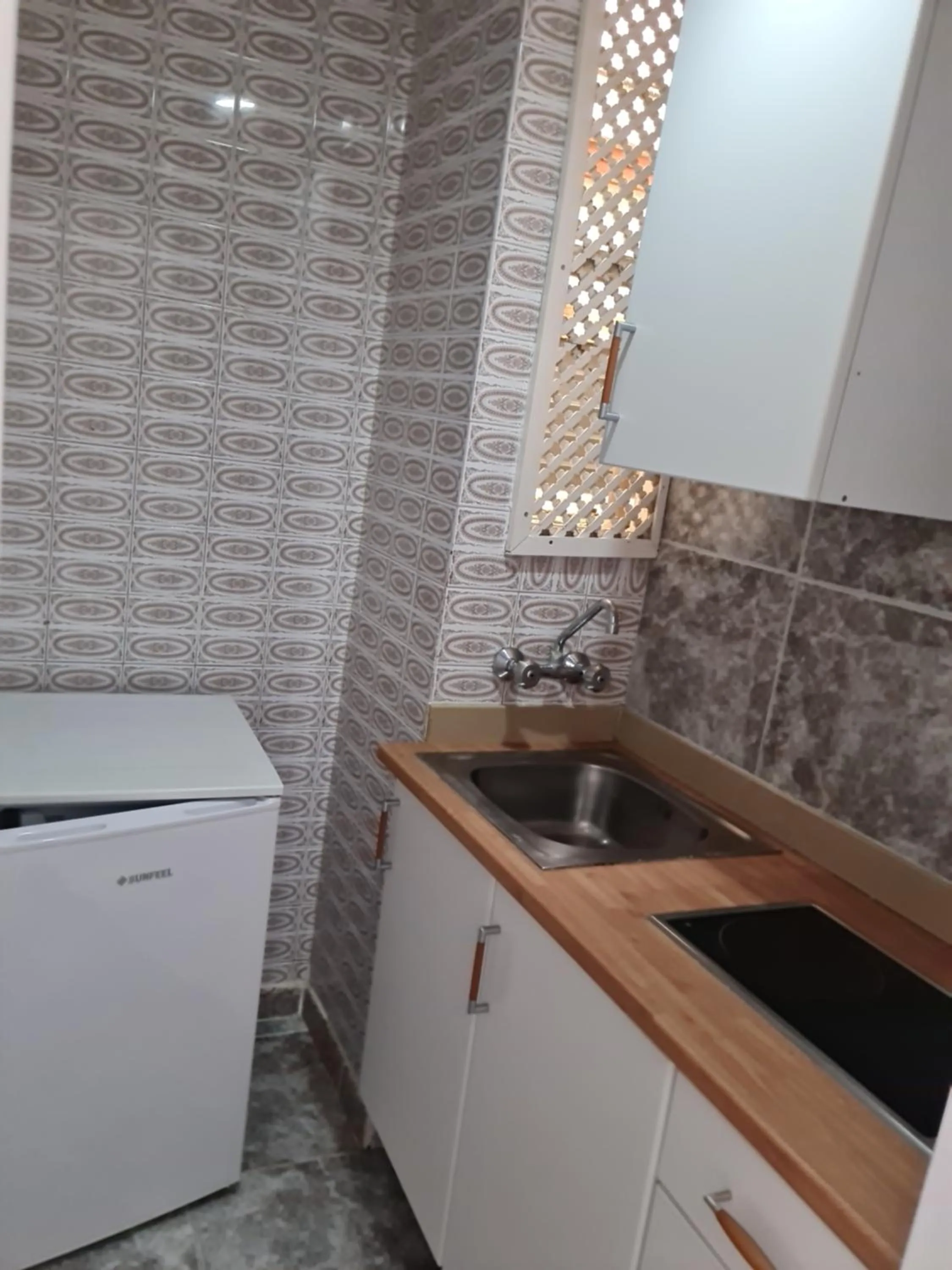 Kitchen or kitchenette in Apartamentos Catalina Park