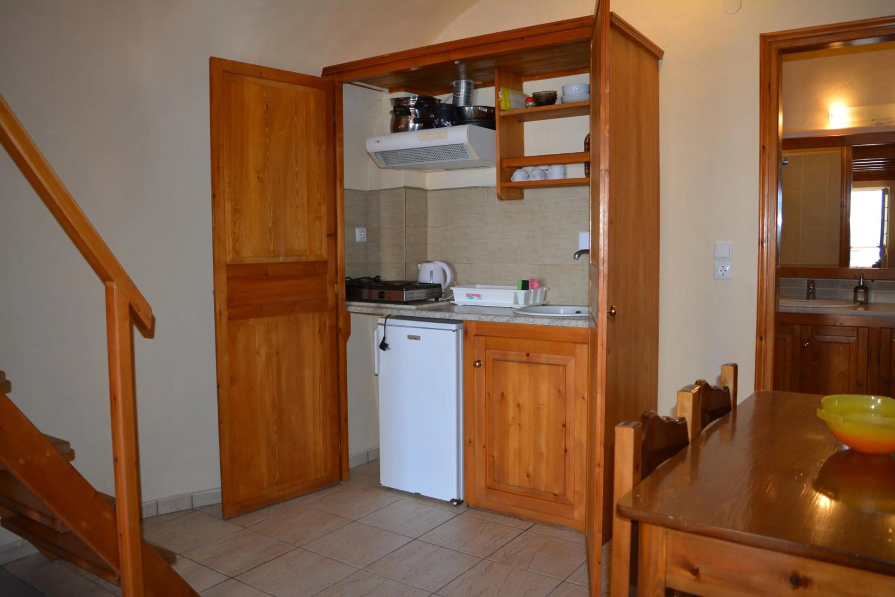 Kitchen or kitchenette in Anemomilos Suites