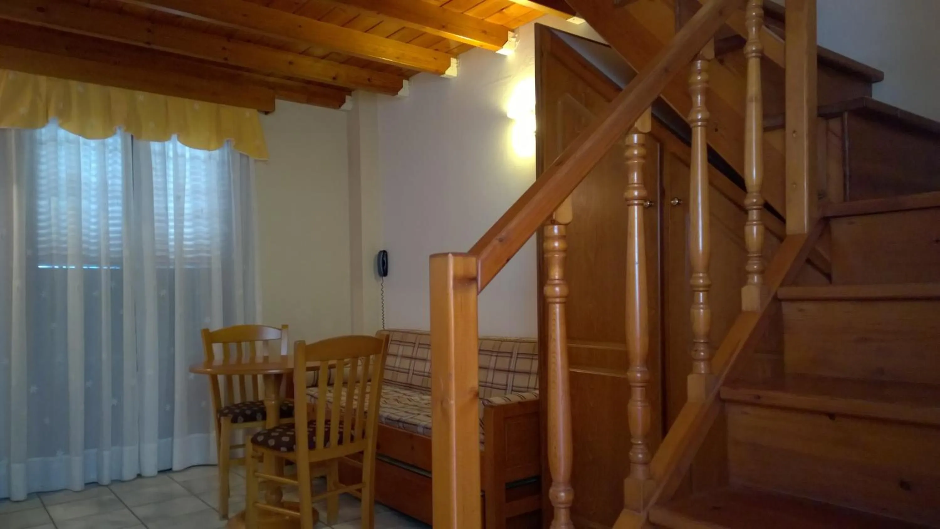 Seating area in Anemomilos Suites