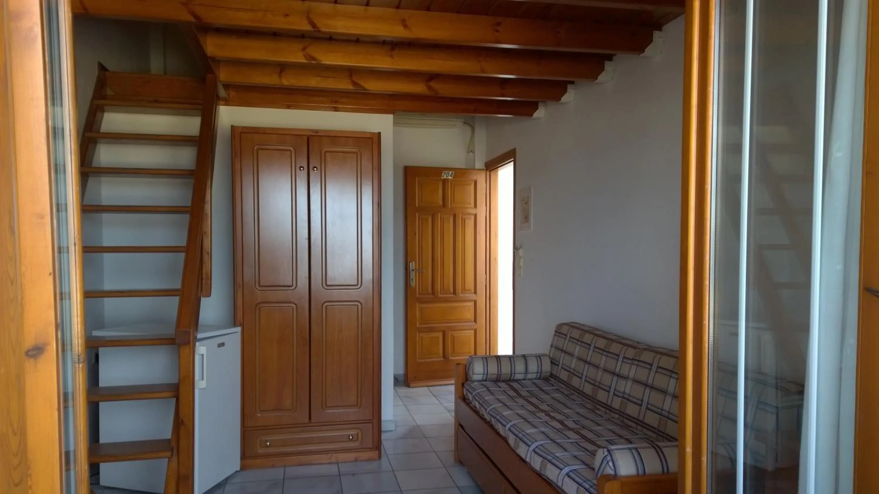 Seating area in Anemomilos Suites