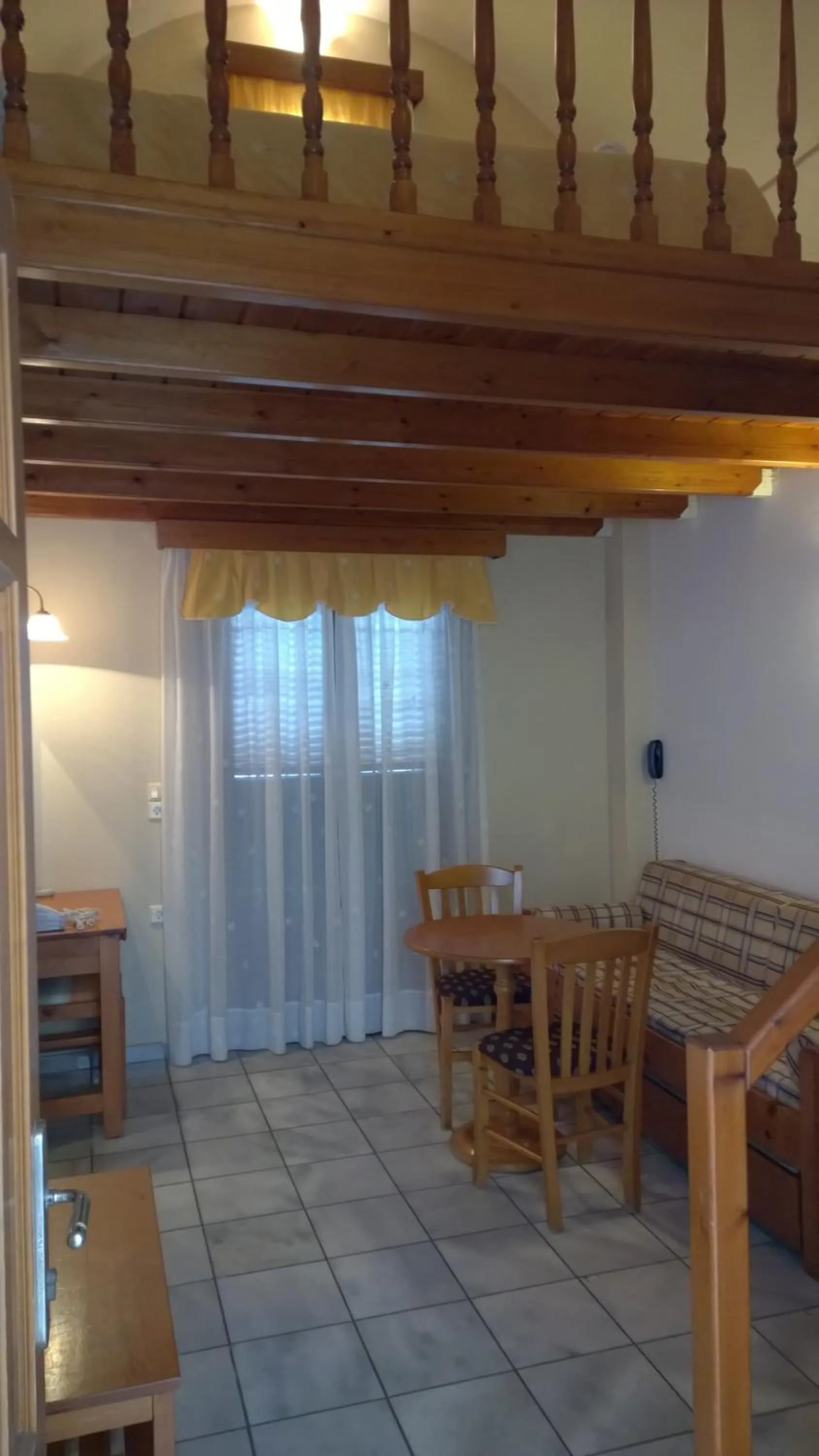 Seating area in Anemomilos Suites