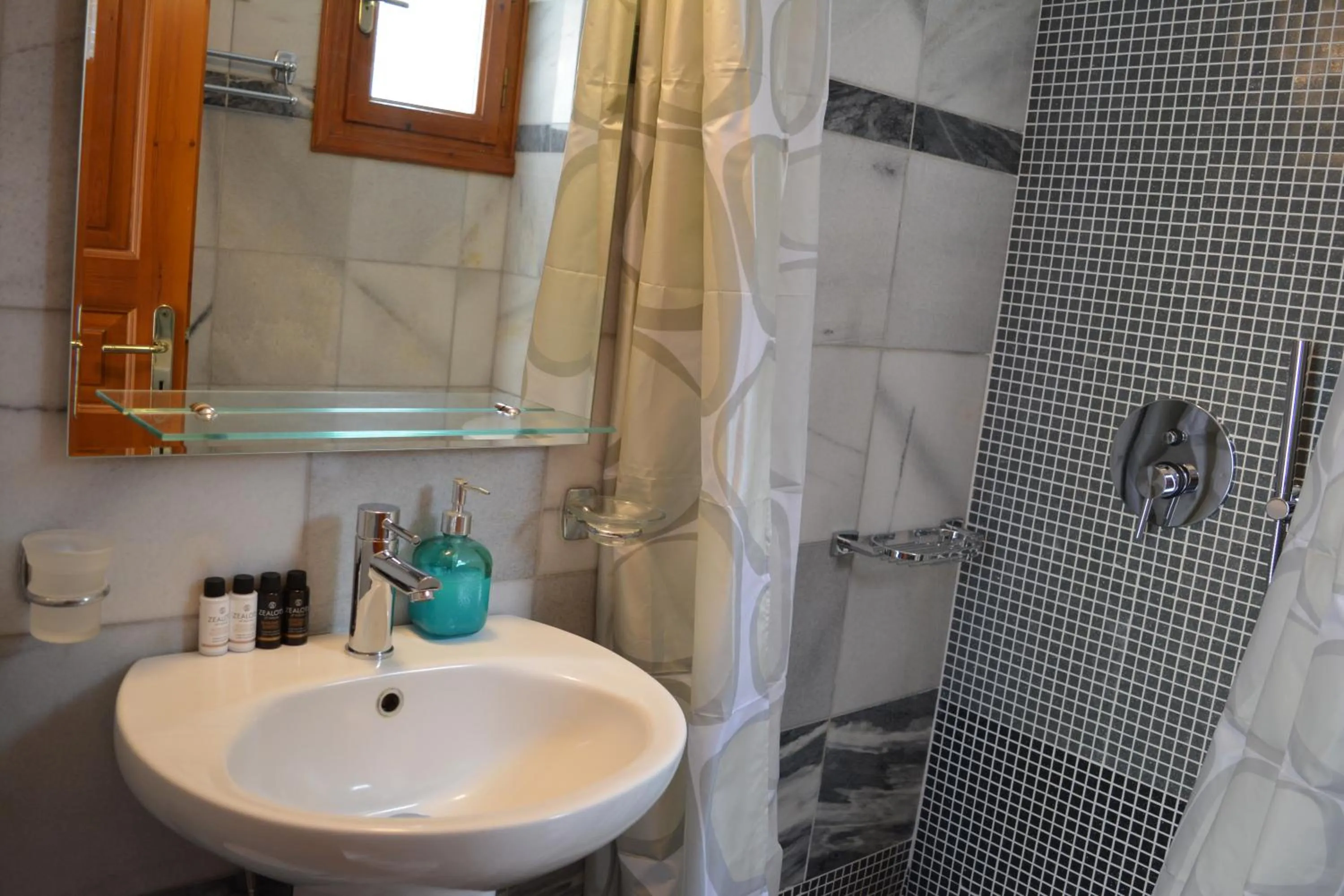 Bathroom in Anemomilos Suites