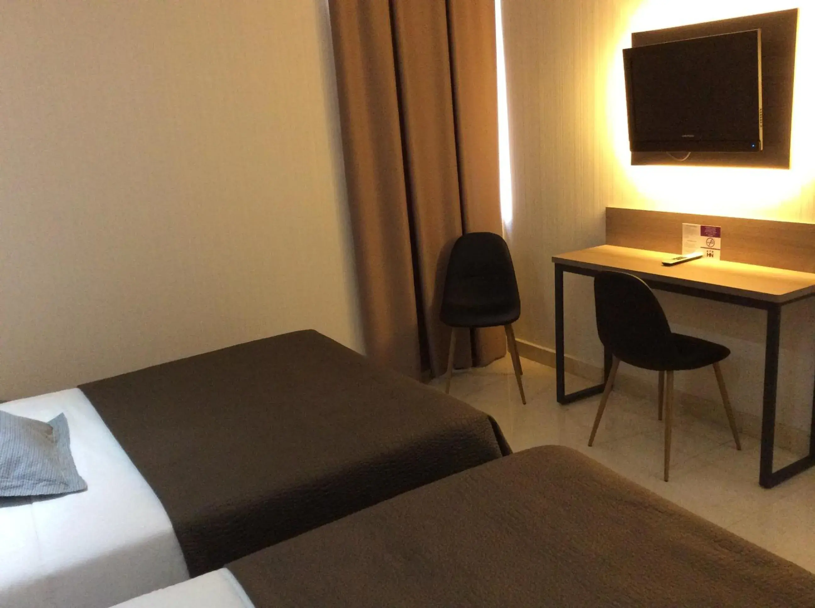 Photo of the whole room, Bed in Hotel Ciudad de Fuenlabrada Photo of the whole room, Bed in Hotel Ciudad de Fuenlabrada