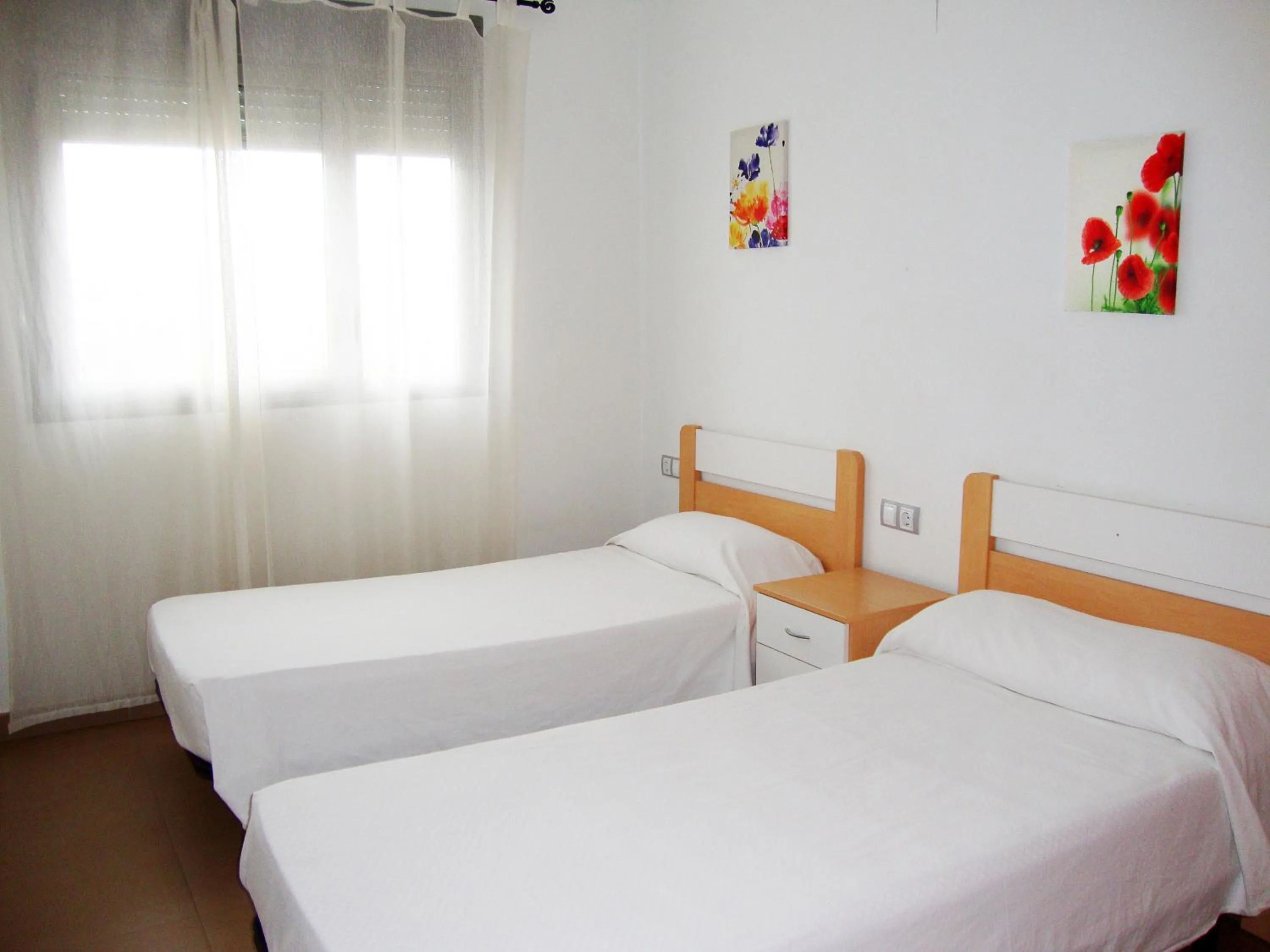 Bed in Apartamentos Alcocebre Suites 3000