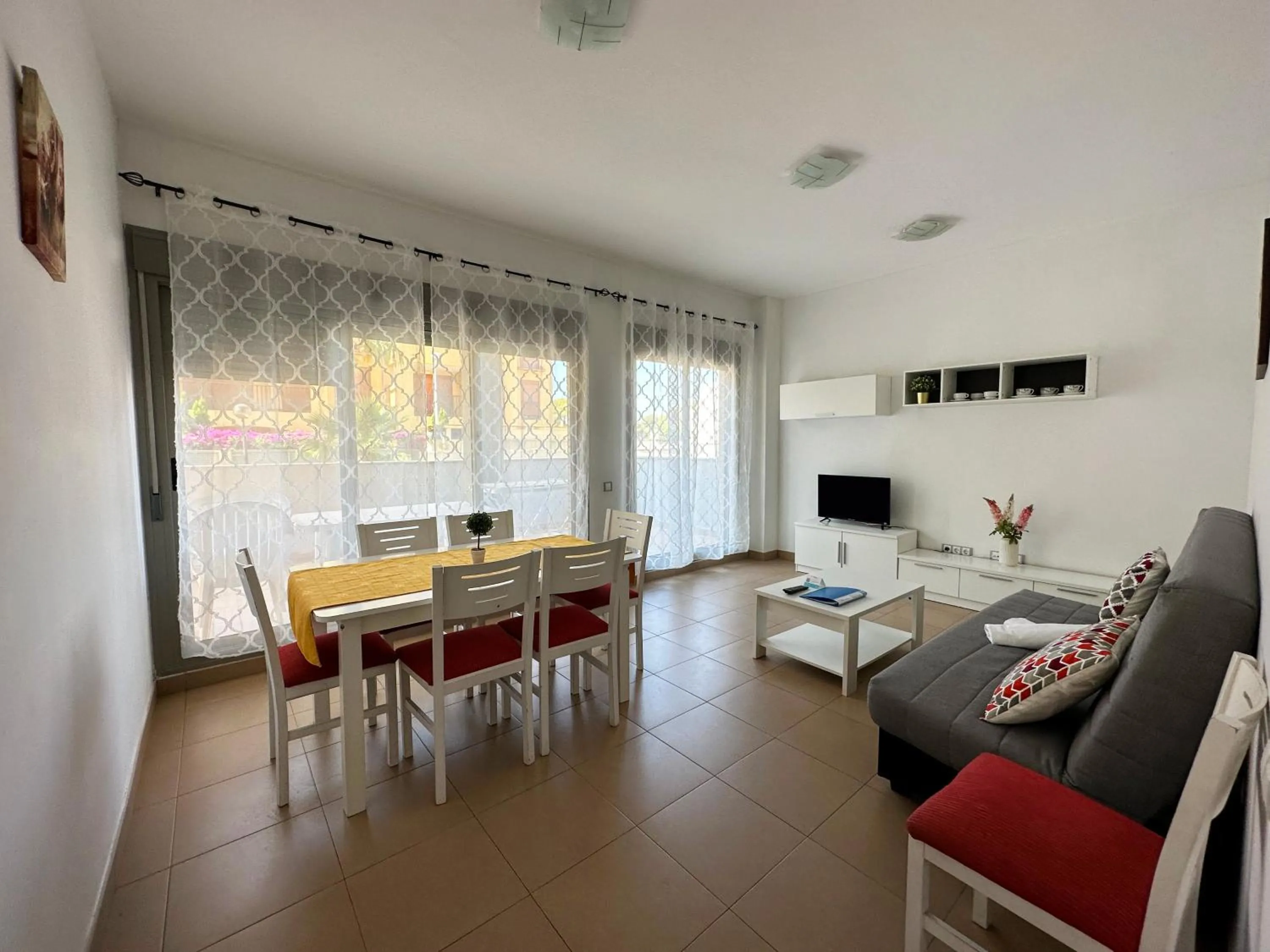 TV and multimedia in Apartamentos Alcocebre Suites 3000