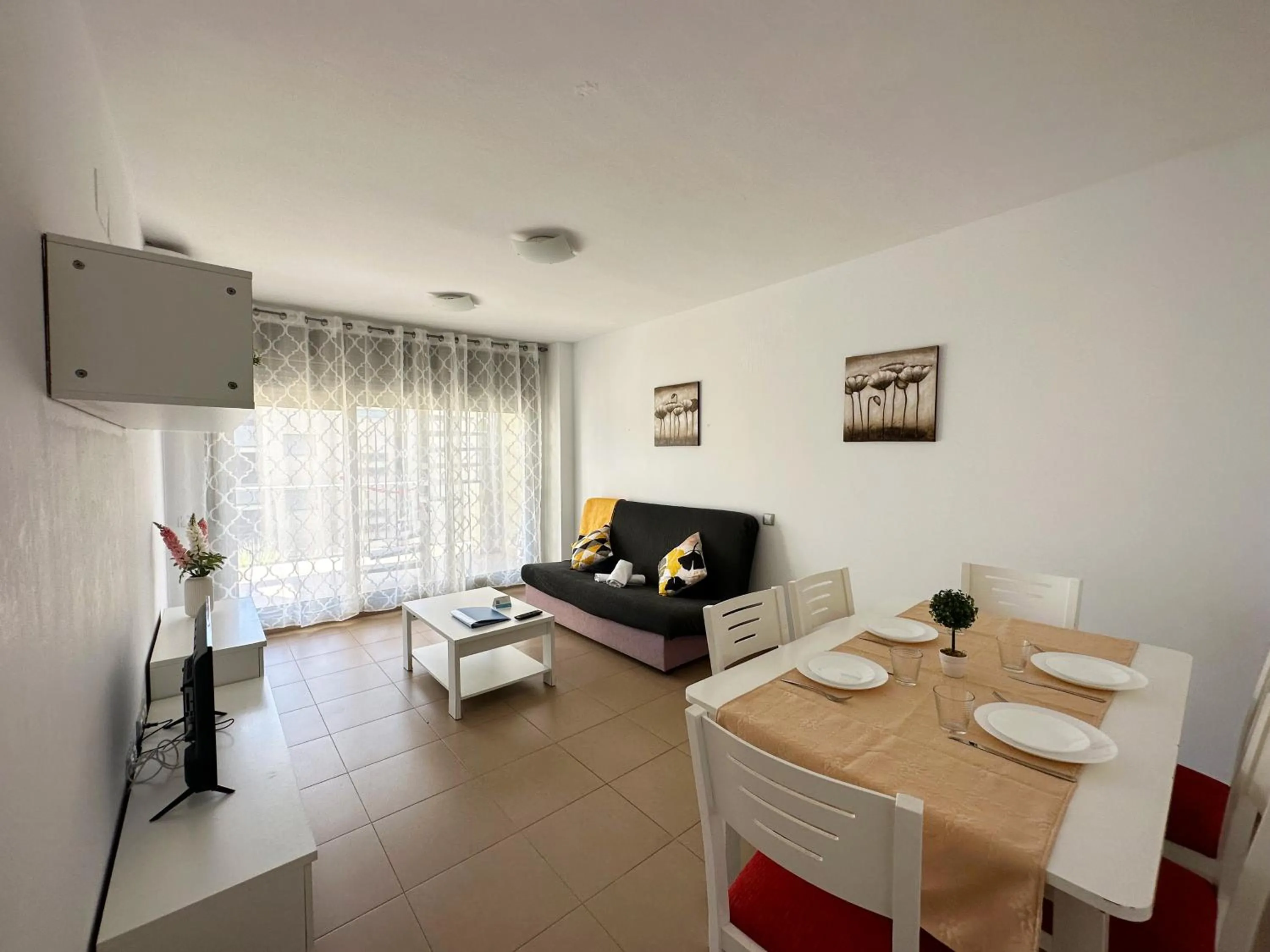 TV and multimedia in Apartamentos Alcocebre Suites 3000