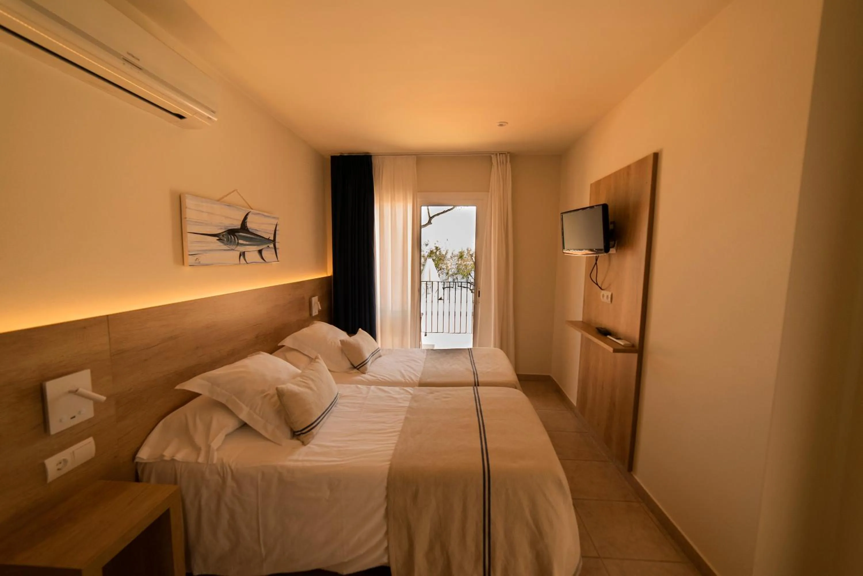 Bed in Hotel Tamariu