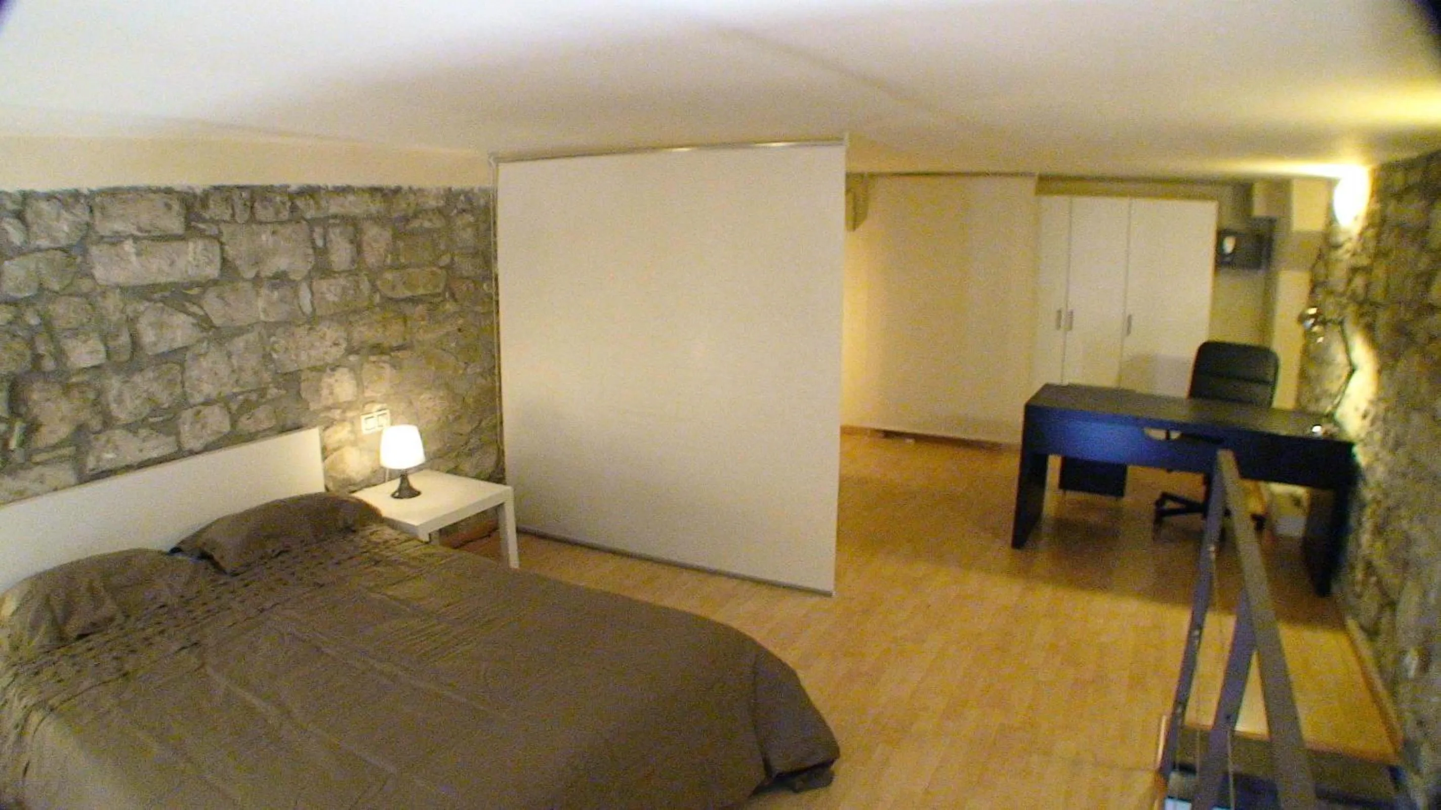 Bed in Urbi Apartments