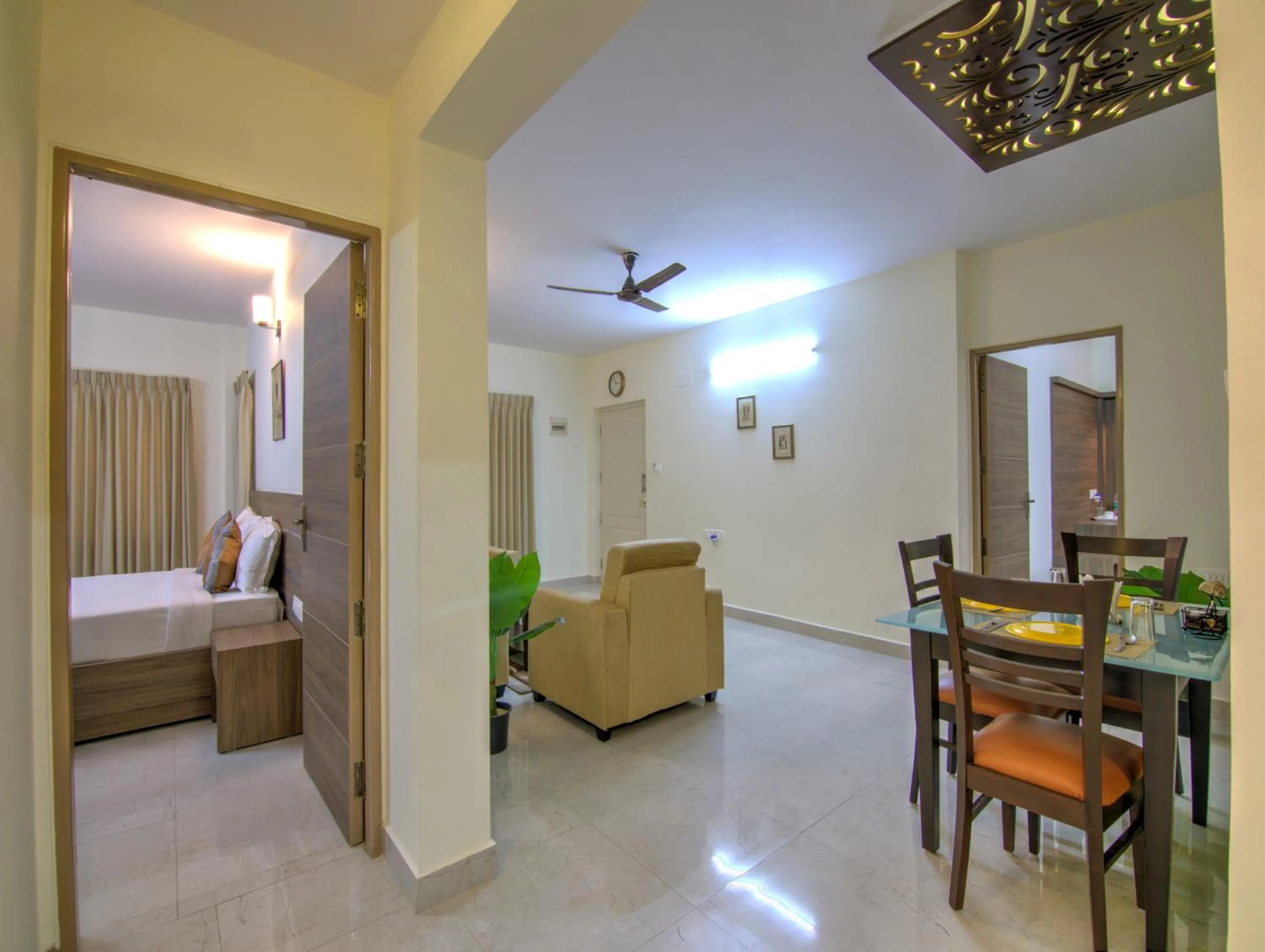 Bed in Sunshine Suites Grand Deluxe