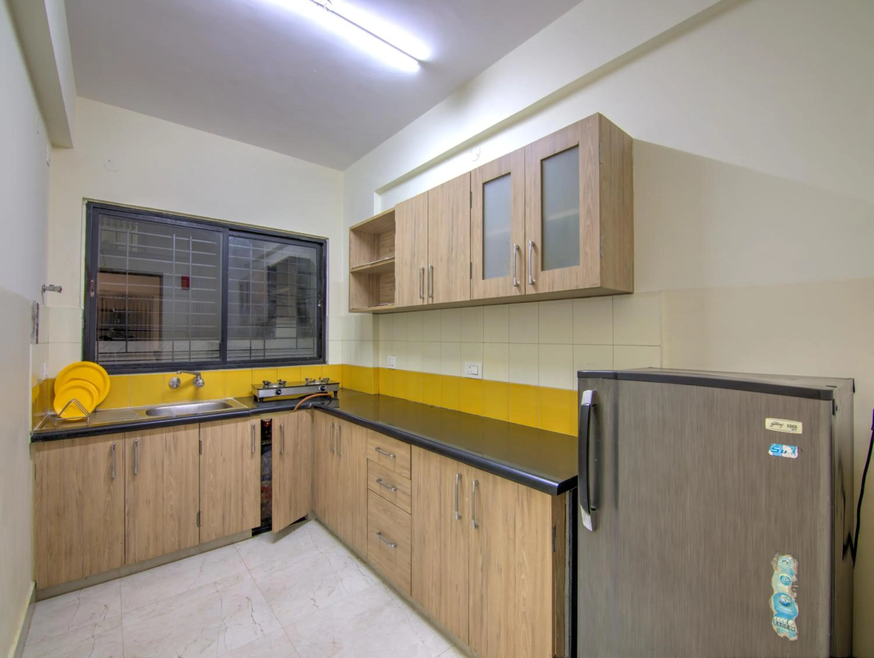 Kitchen or kitchenette in Sunshine Suites Grand Deluxe