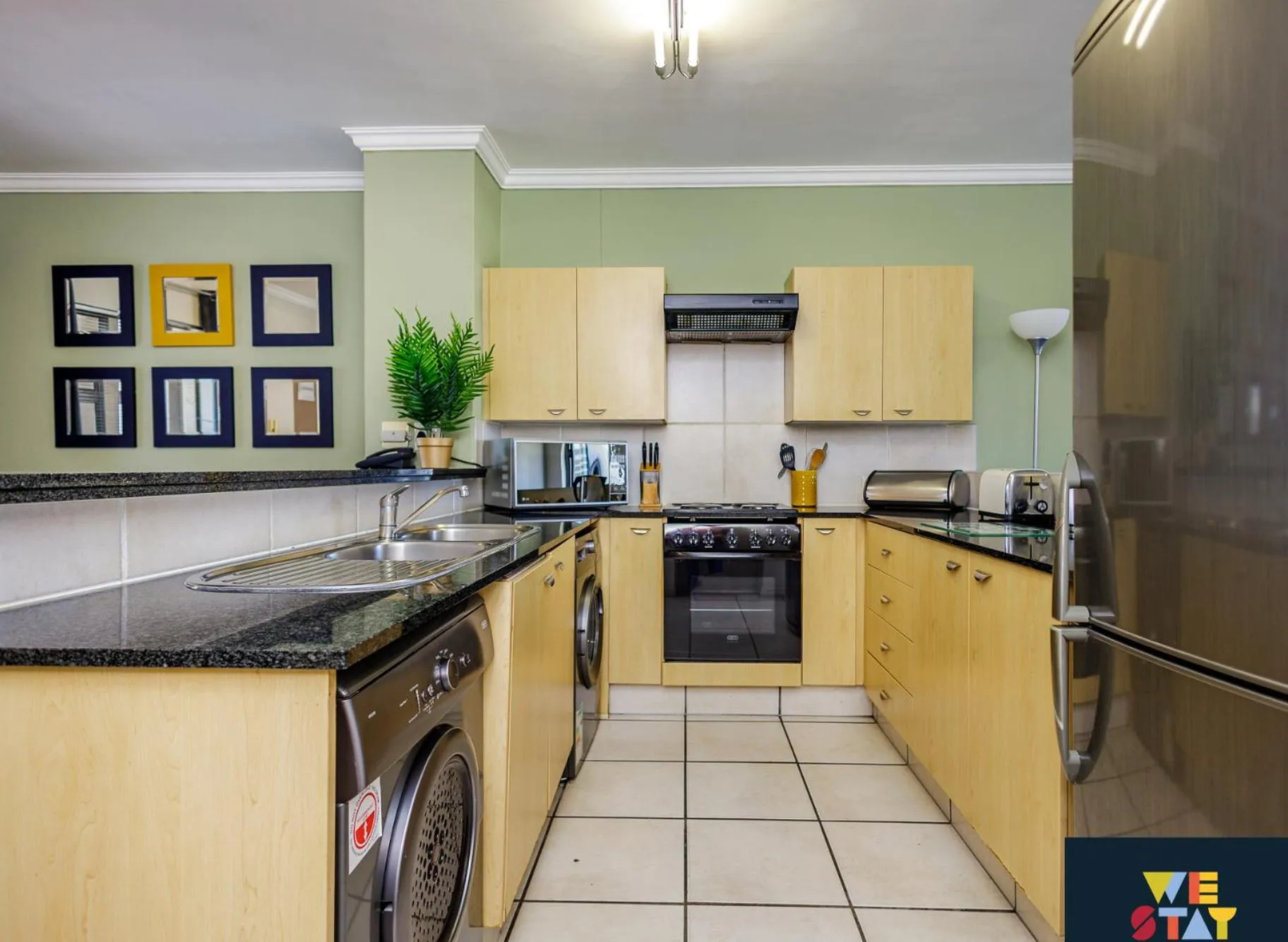Kitchen or kitchenette in WeStay Westpoint Apartments
