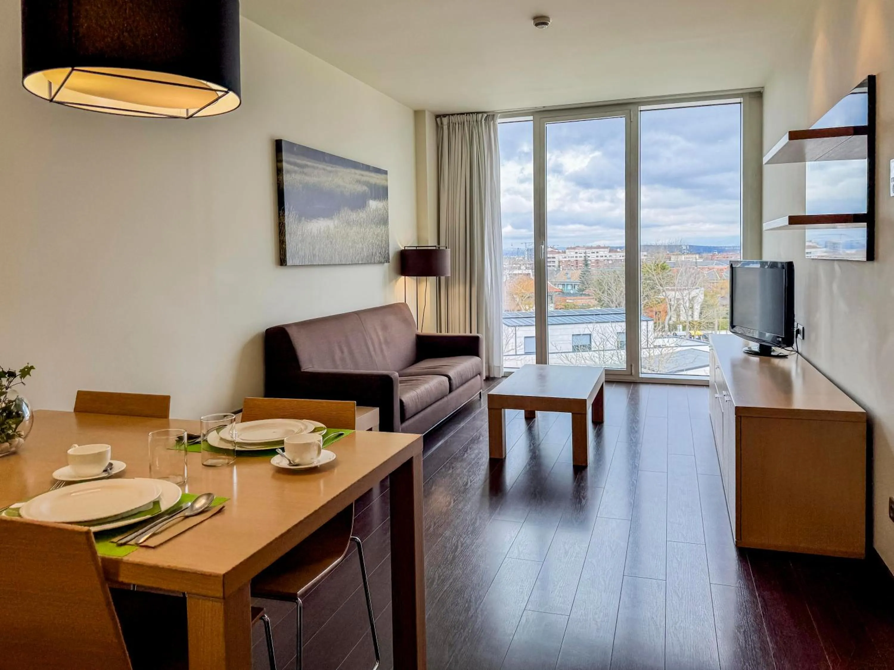 Living room in Hotel Jardines de Uleta Suites