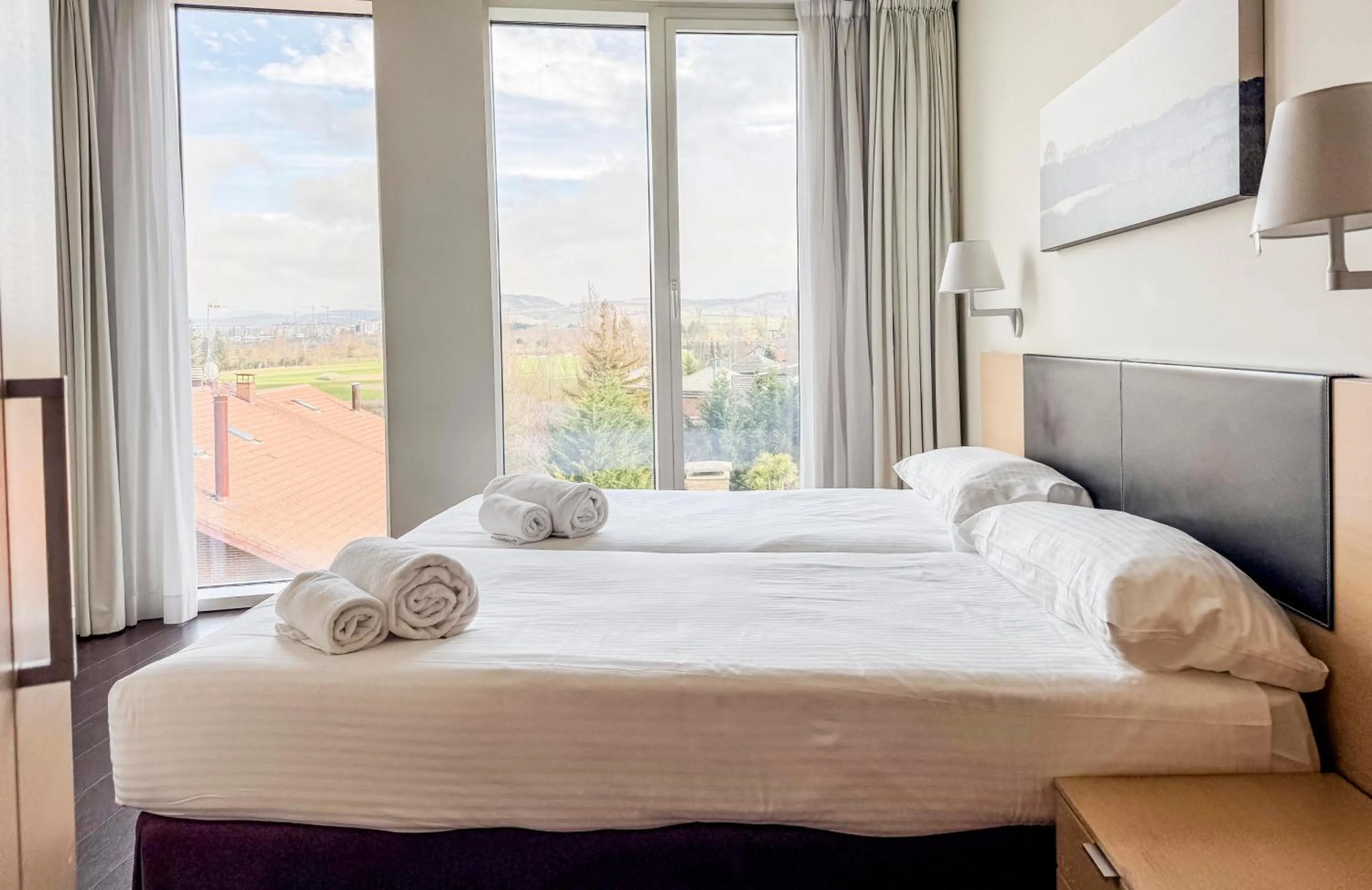 Bedroom, Bed in Hotel Jardines de Uleta Suites