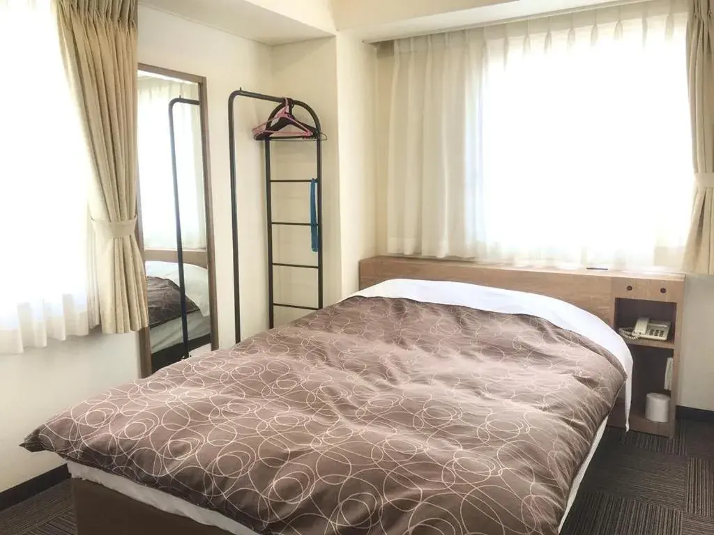 Bed in Ichinomiya Green Hotel Bed in Ichinomiya Green Hotel