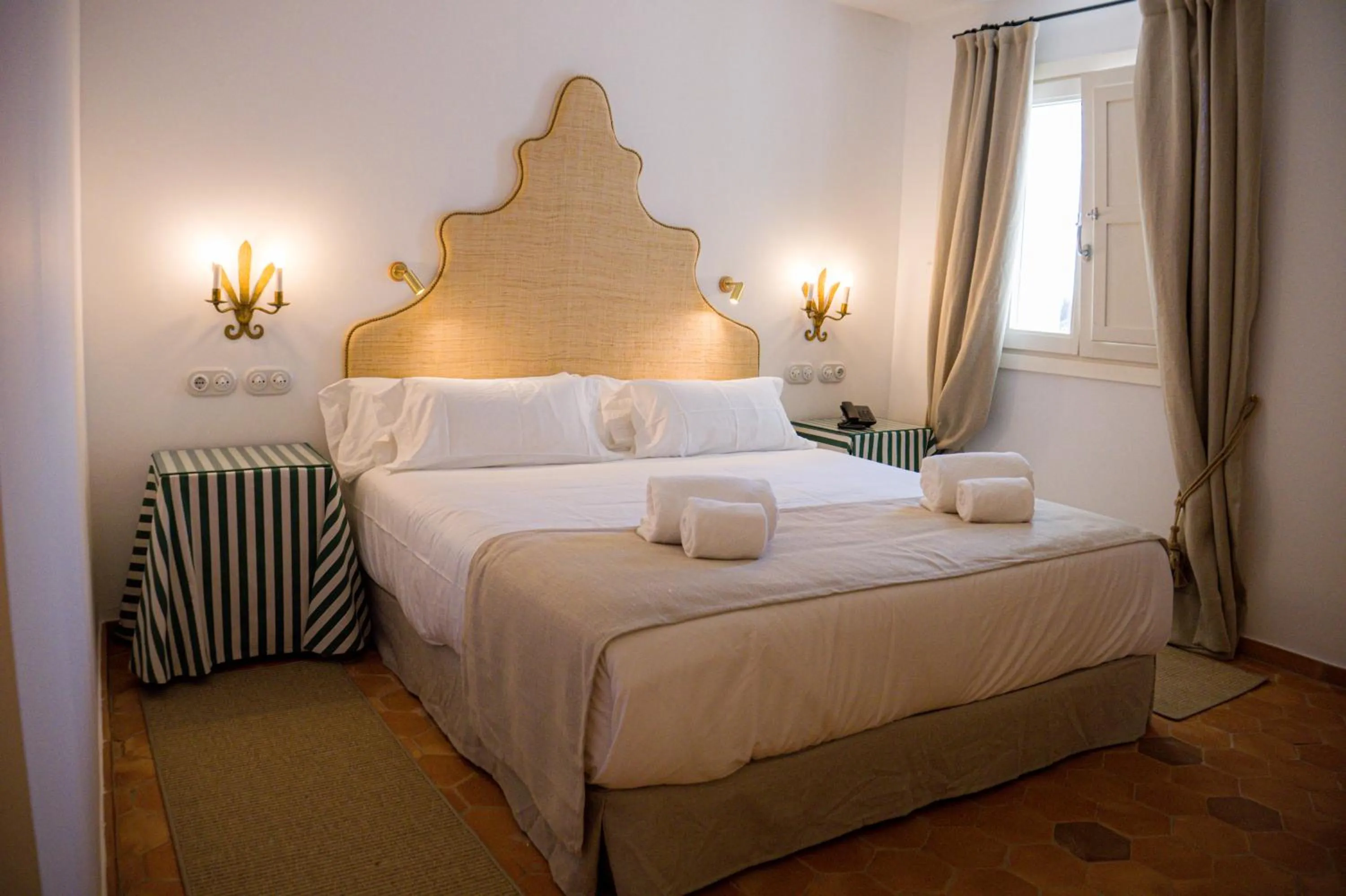 Bed in Casa Pizarro Hotel