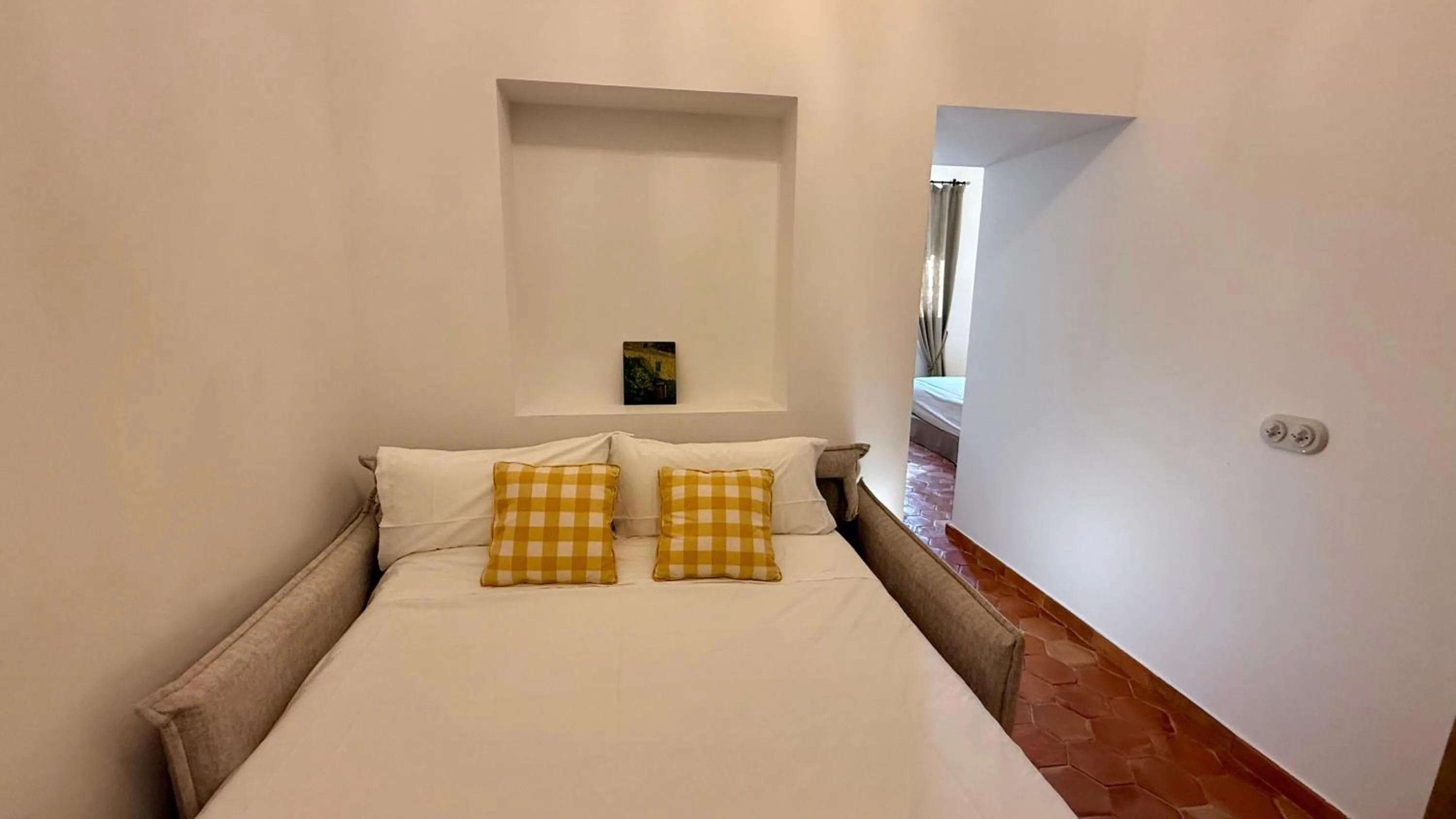 Bed in Casa Pizarro Hotel
