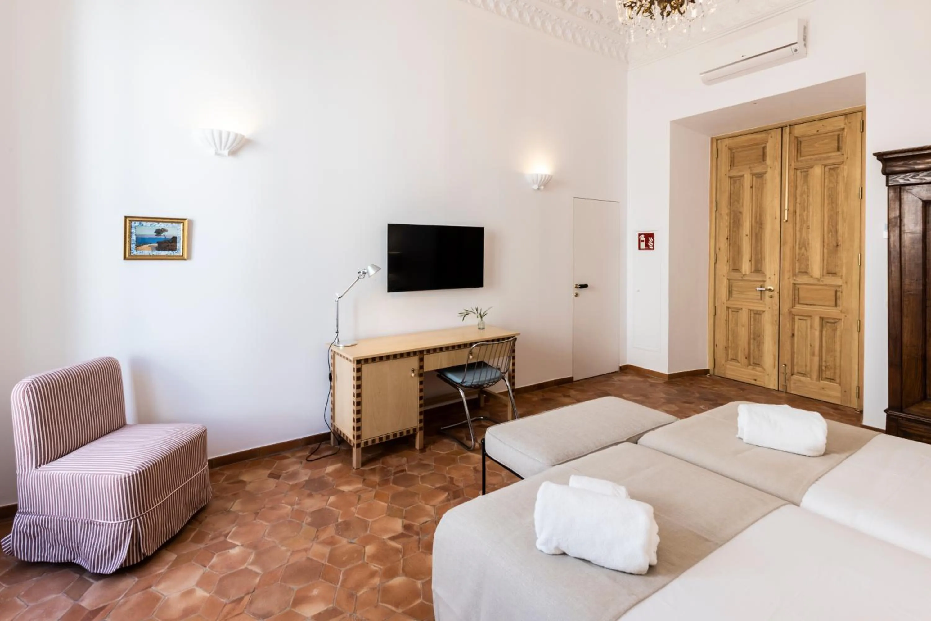 Bed in Casa Pizarro Hotel