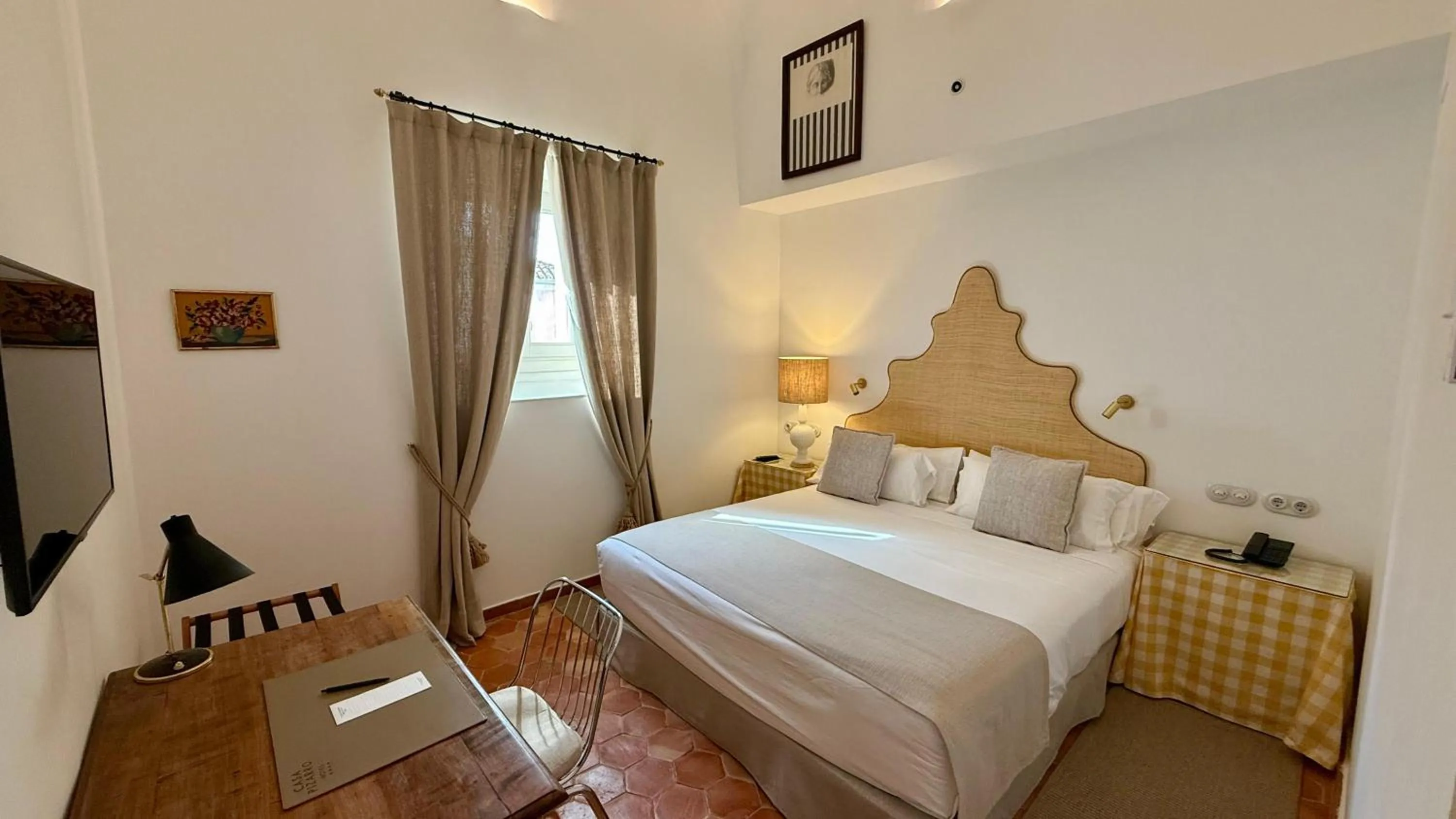 Bed in Casa Pizarro Hotel