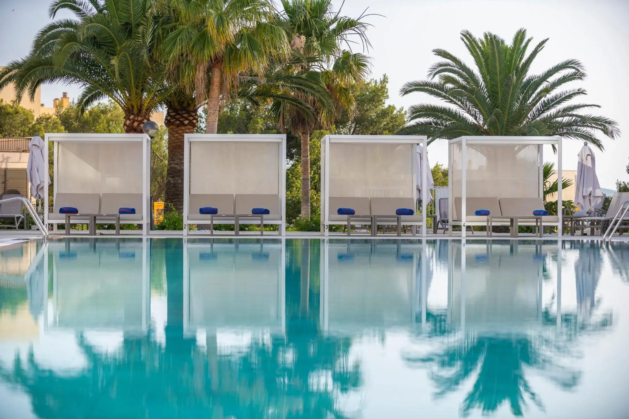 Swimming pool in Tomir Portals Suites - Adults Only Swimming pool in Tomir Portals Suites - Adults Only