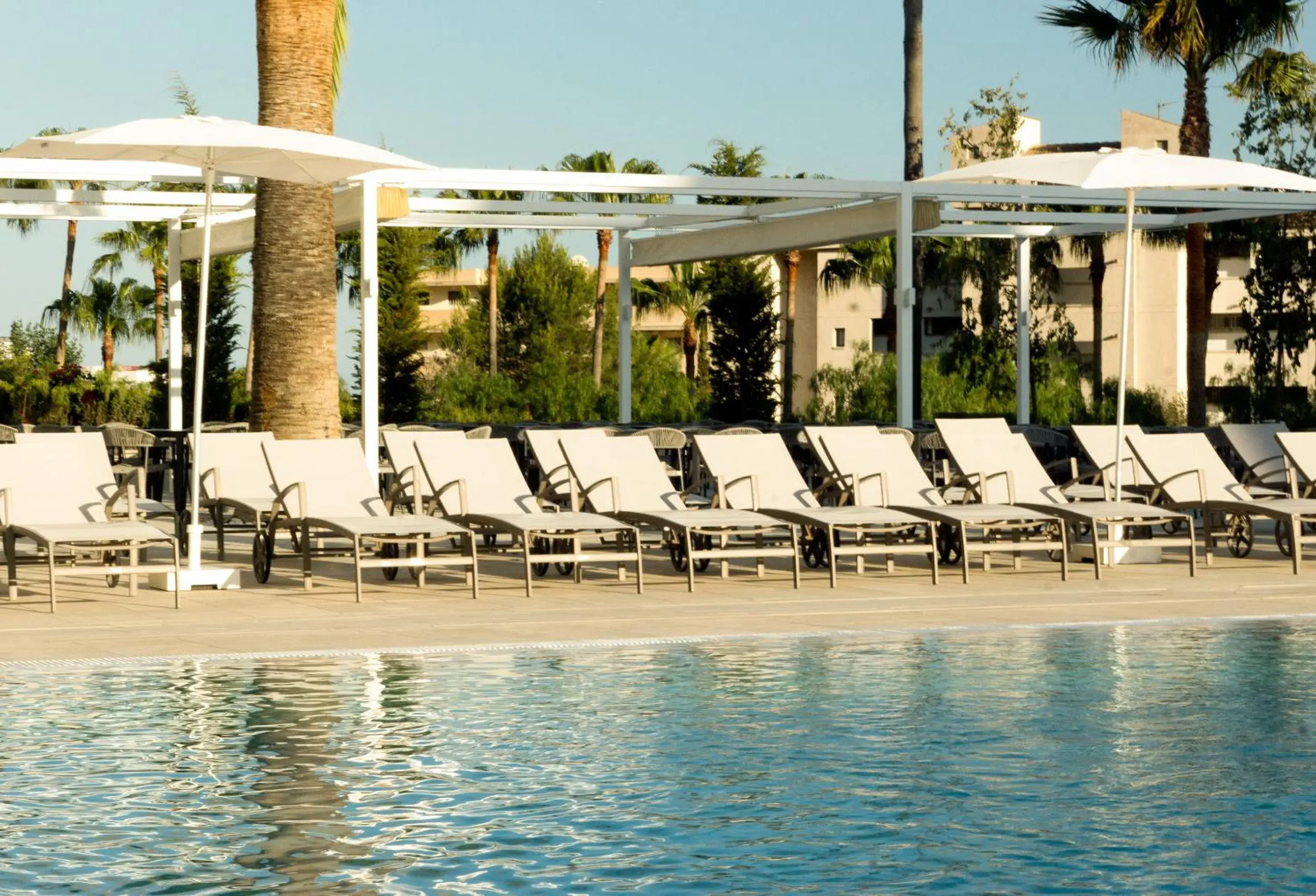 Swimming pool in Tomir Portals Suites - Adults Only Swimming pool in Tomir Portals Suites - Adults Only