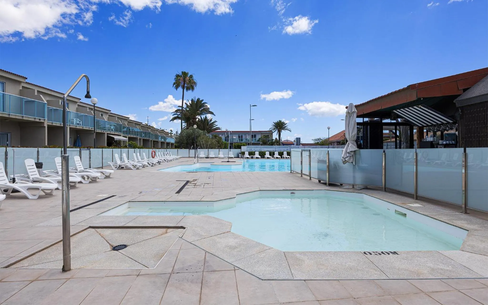 Pool view in Smartr Maspalomas Corinto