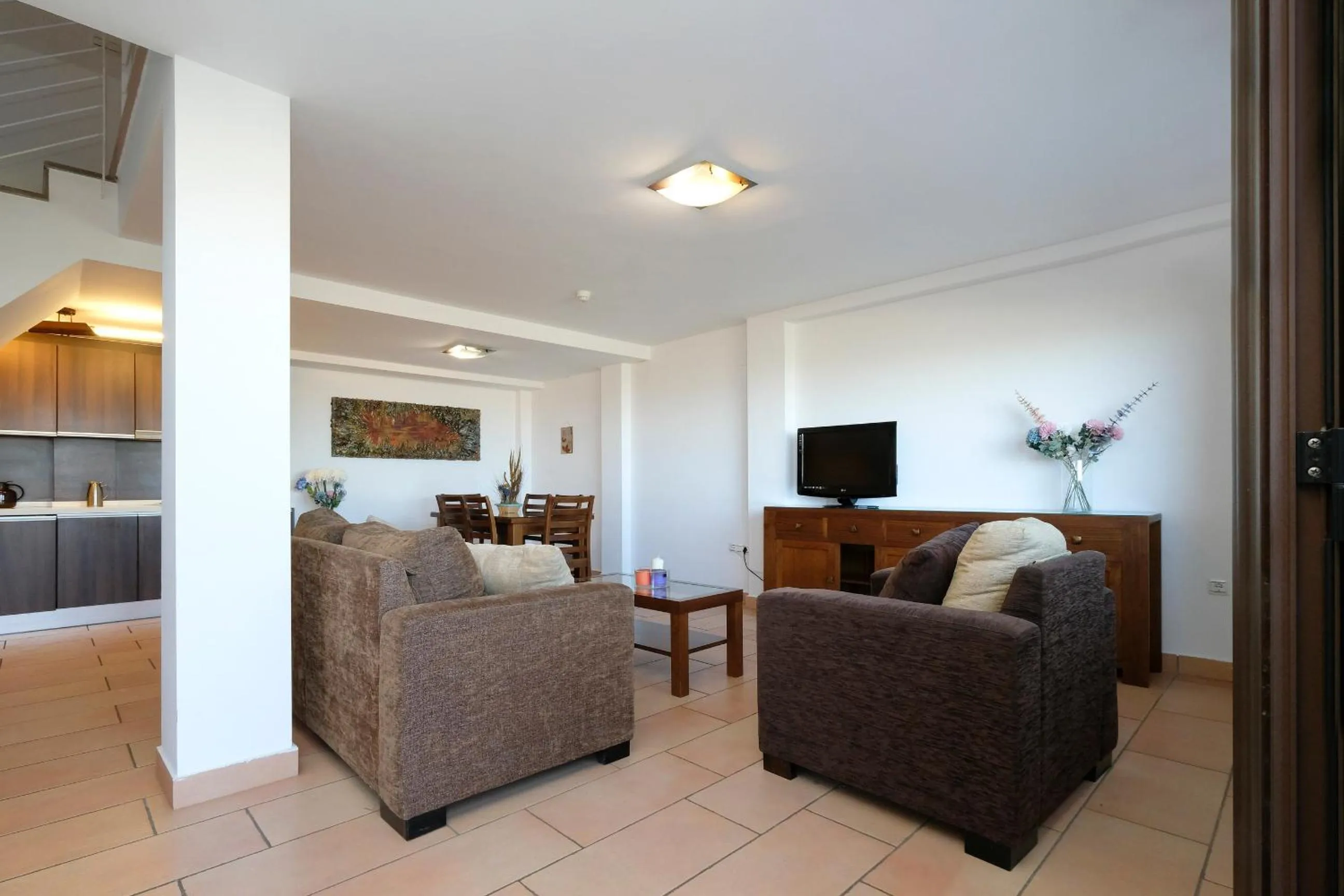 Living room, Bed in Los Castillarejos Apartamentos Rurales