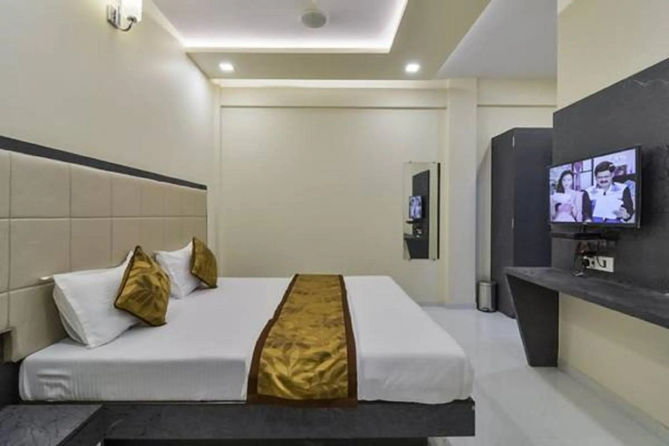Photo of the whole room, Bed in Hotel Aroma- Dadar