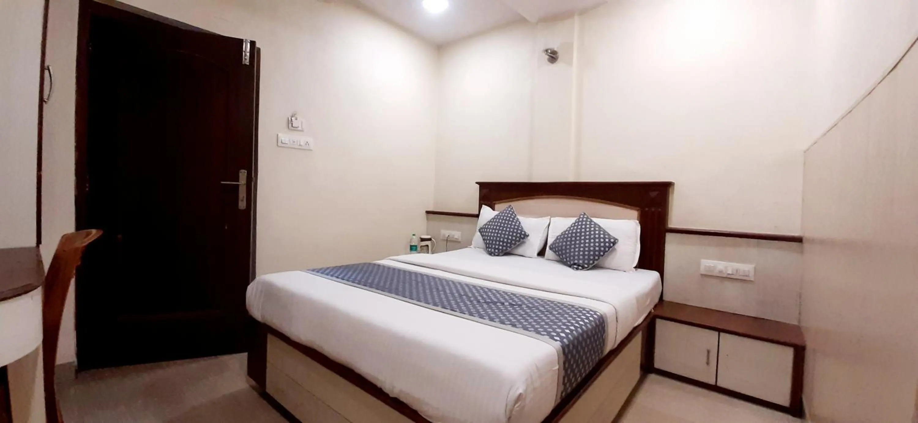 Photo of the whole room, Bed in Hotel Aroma- Dadar