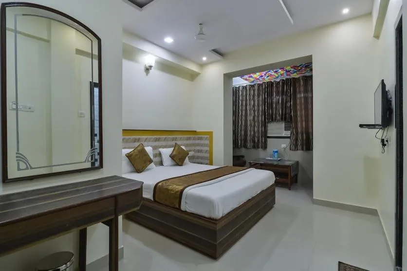 Photo of the whole room, Bed in Hotel Aroma- Dadar