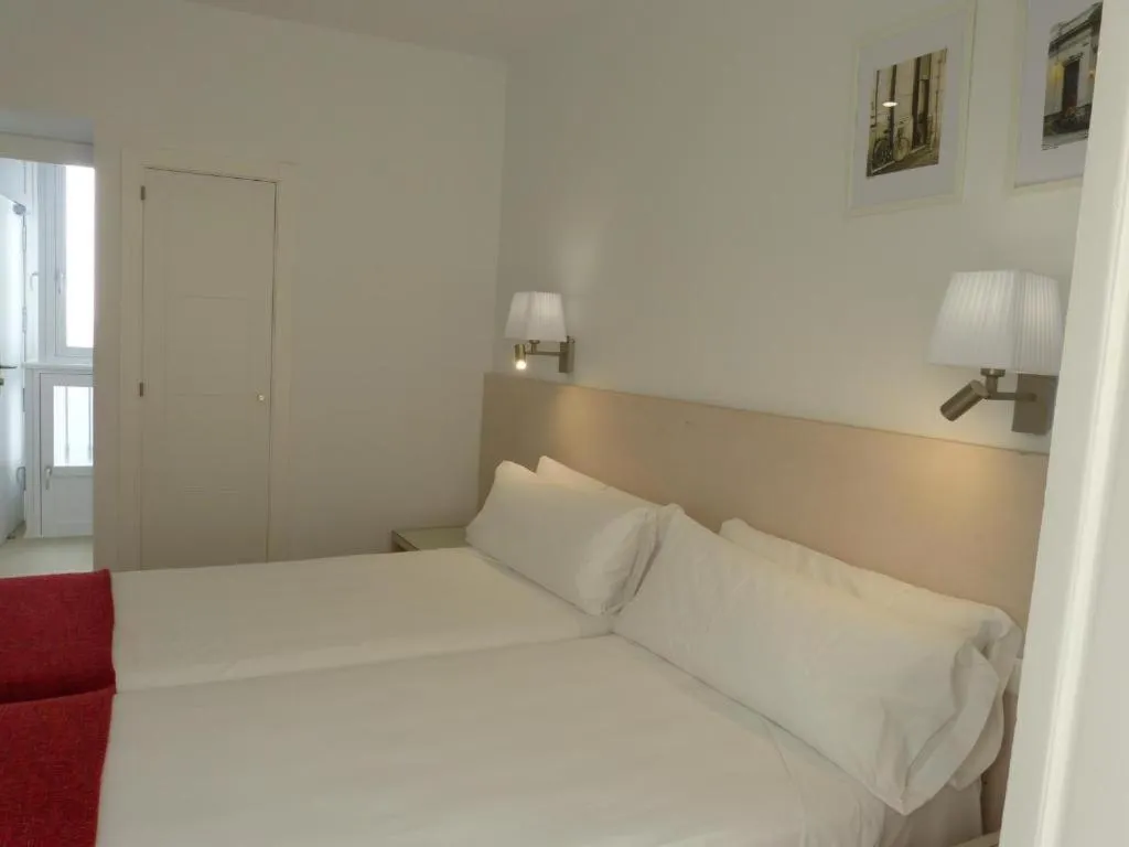 Bed in Hotel Apartamentos Patagonia Sur